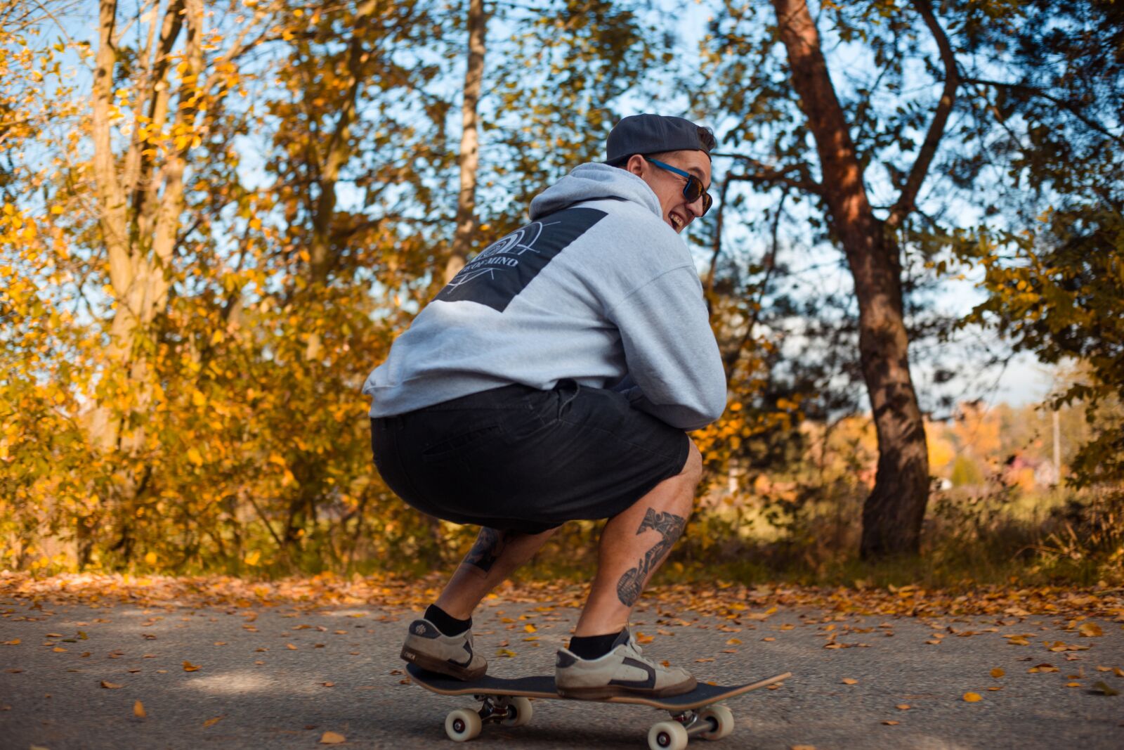 Canon EF 50mm F1.8 II sample photo. Skateboard, man, autumn photography