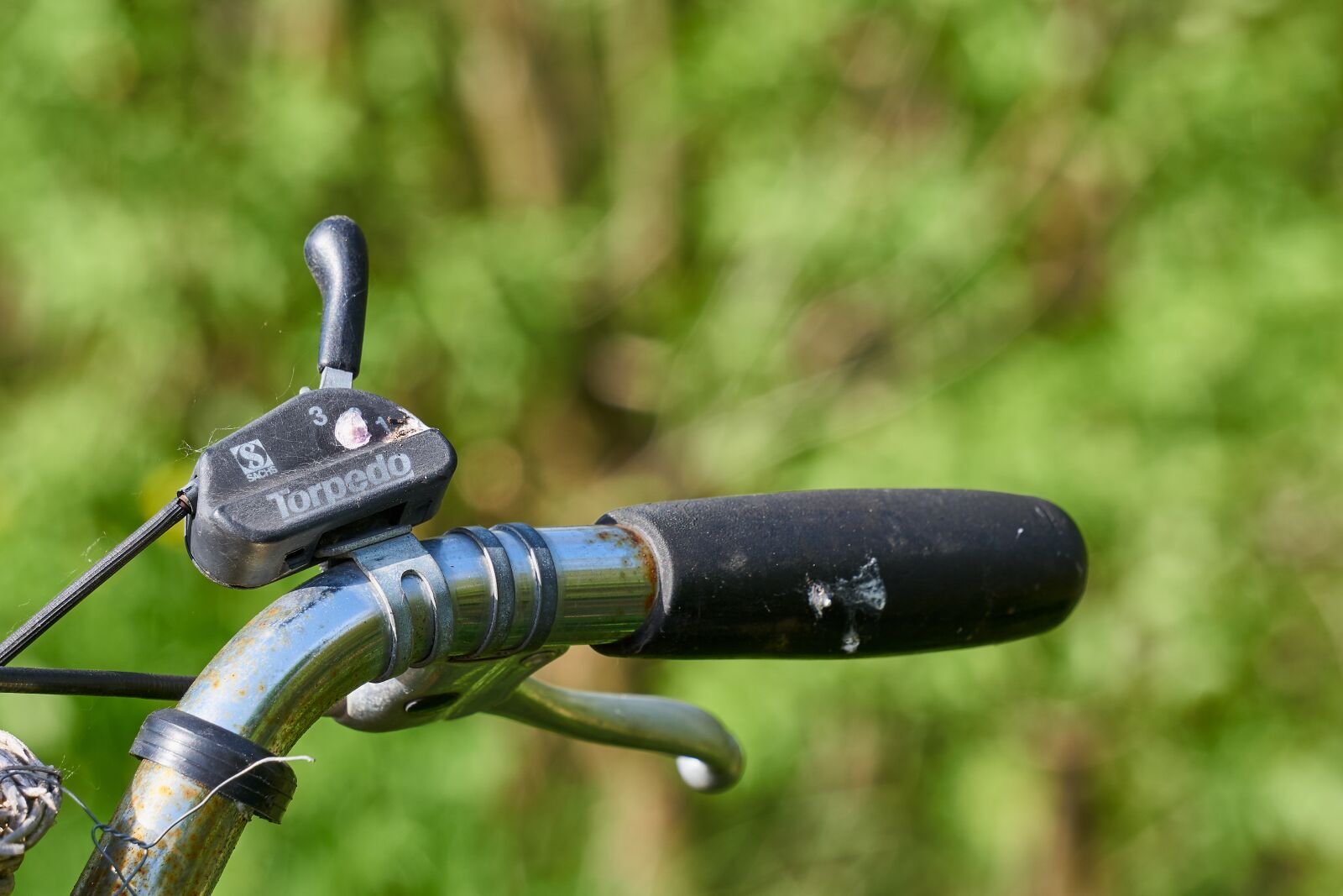 Sony E 55-210mm F4.5-6.3 OSS sample photo. Bike, steering wheel, gears photography
