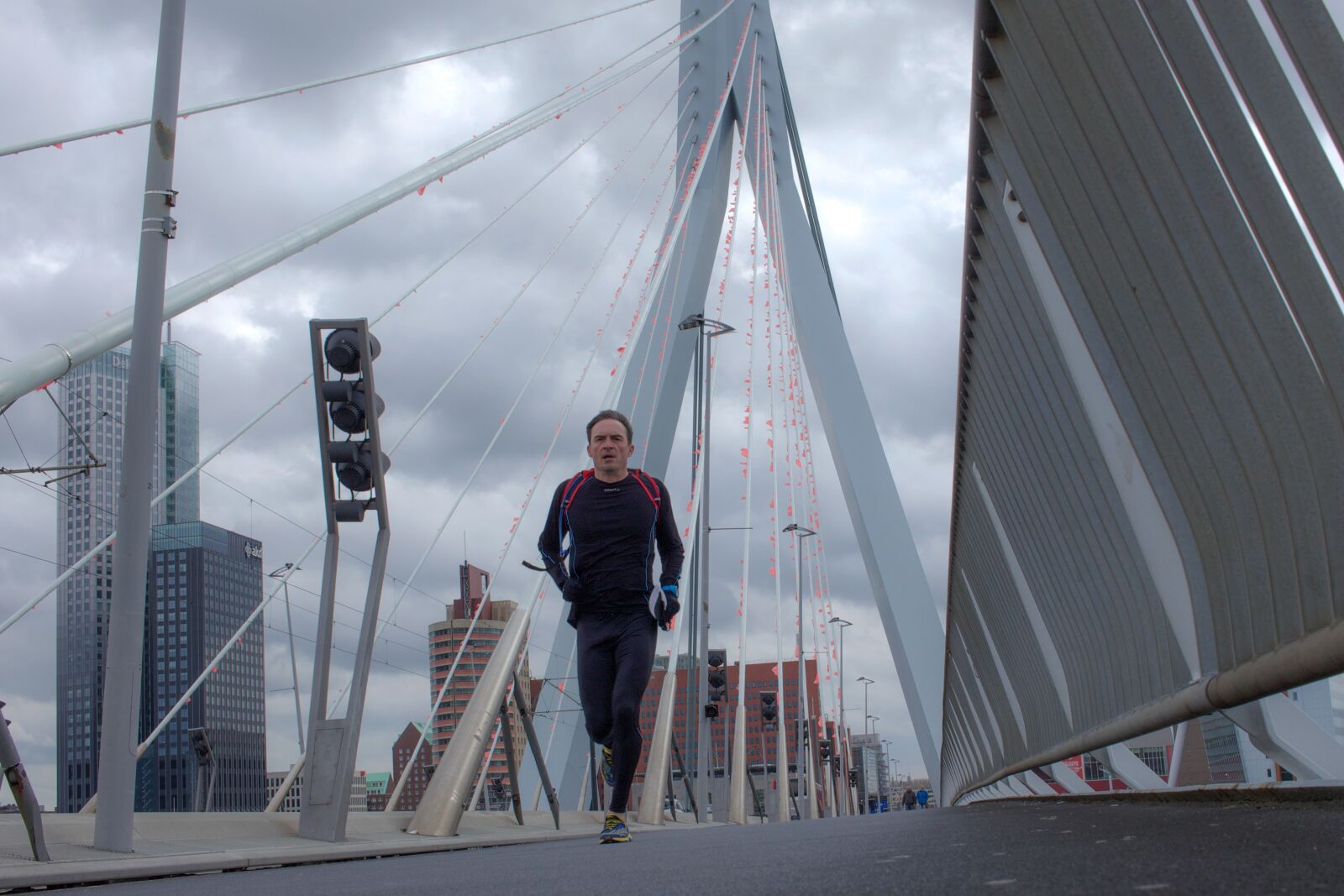 Canon EOS 700D (EOS Rebel T5i / EOS Kiss X7i) sample photo. Running, erasmus bridge, man photography
