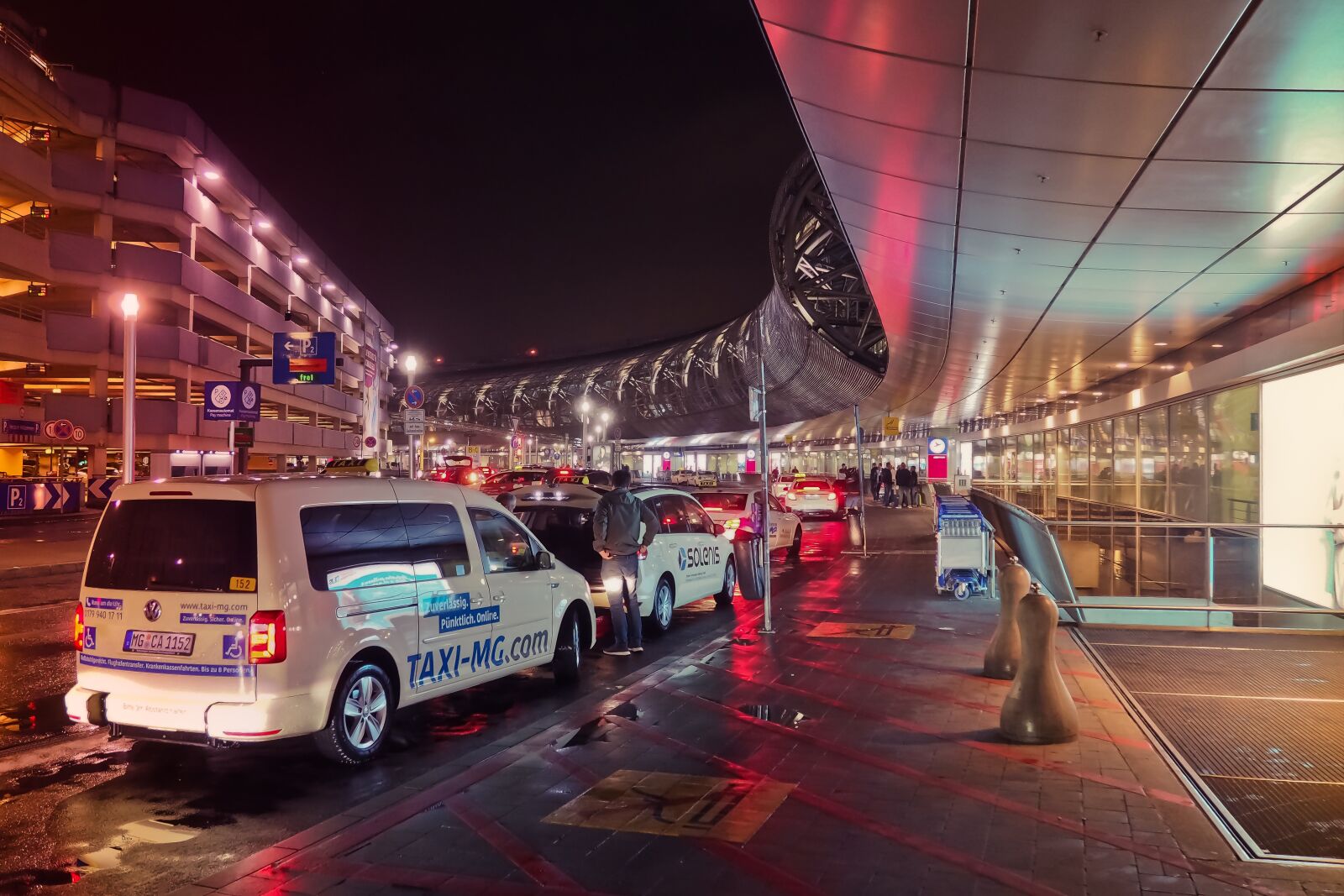 Olympus OM-D E-M10 sample photo. Airport, night, flying photography