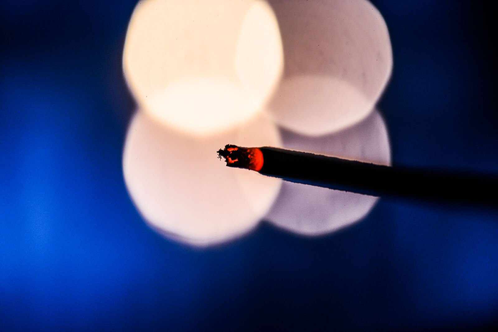 Nikon AF-S Micro-Nikkor 60mm F2.8G ED sample photo. Lighted, cigarette, stick, with photography