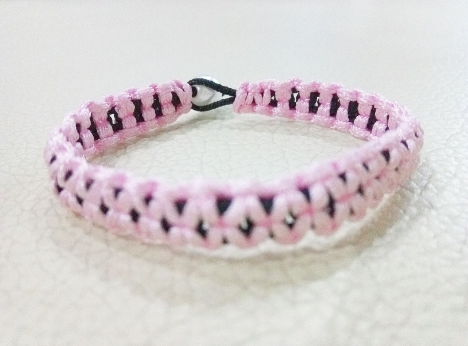 Meizu m1 metal sample photo. Bracelet, braided rope, pink photography
