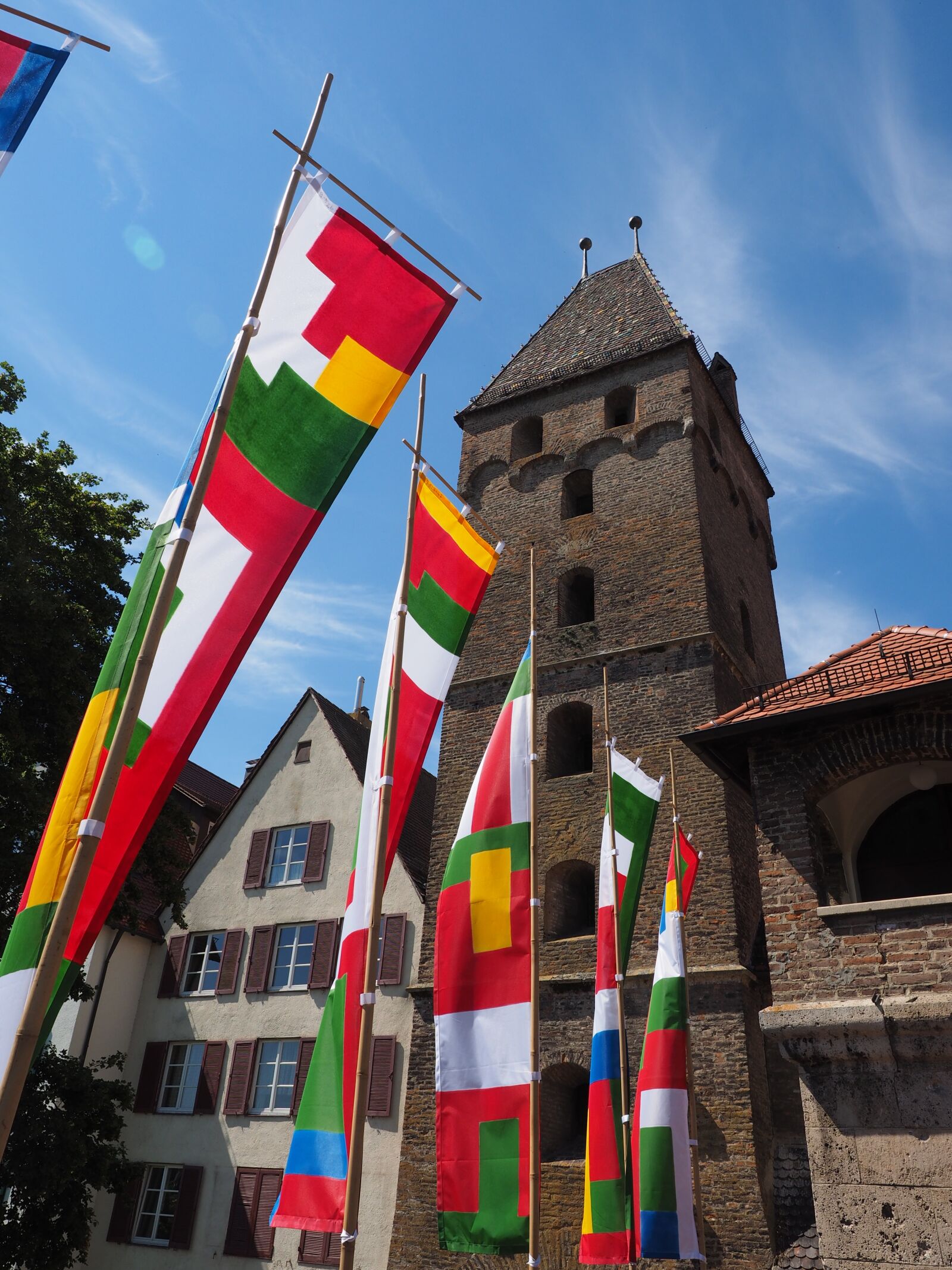 Olympus OM-D E-M1 + Olympus M.Zuiko Digital ED 12-40mm F2.8 Pro sample photo. Flags, colorful, blow photography