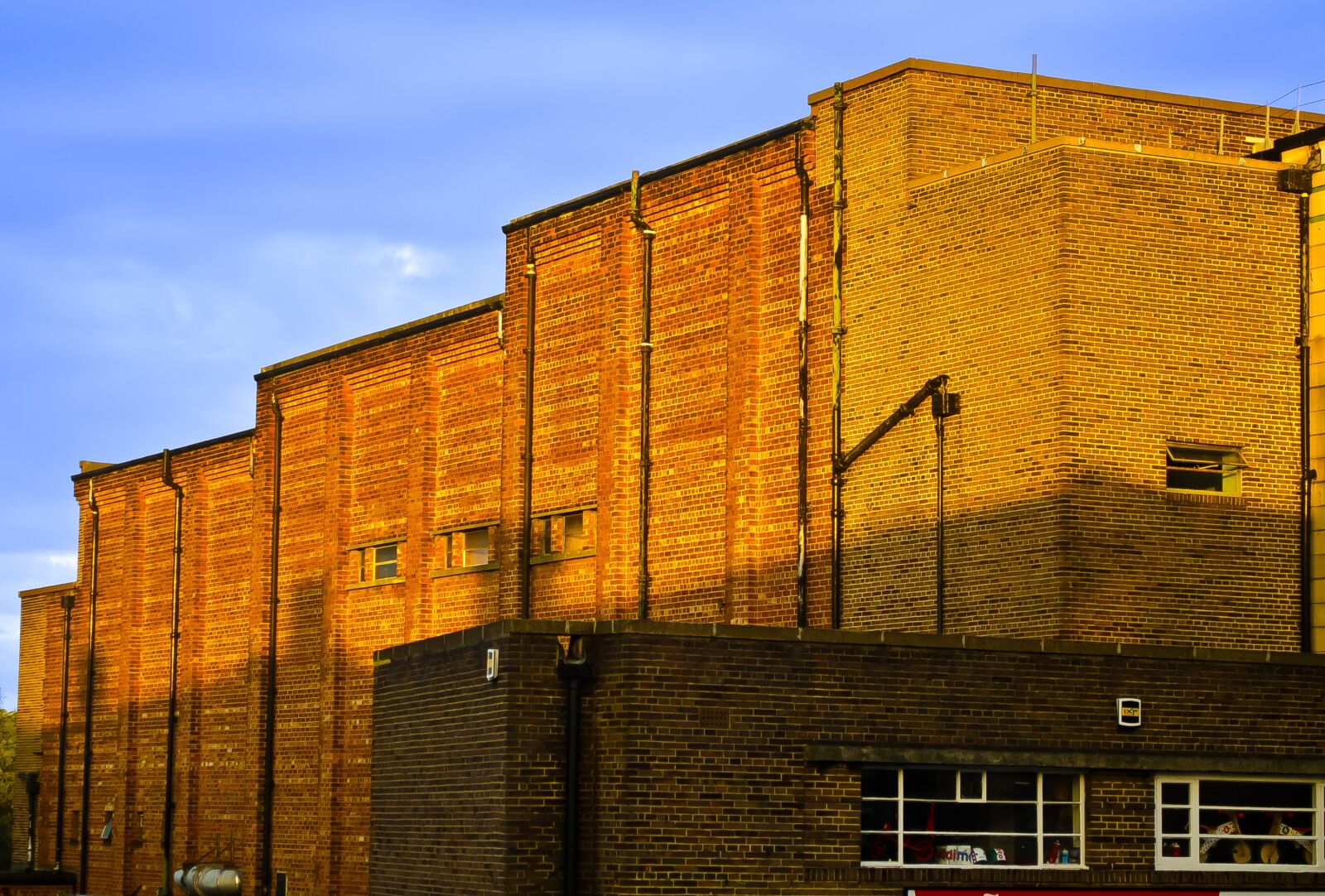 Nikon D5100 sample photo. Brick, building, sunset photography