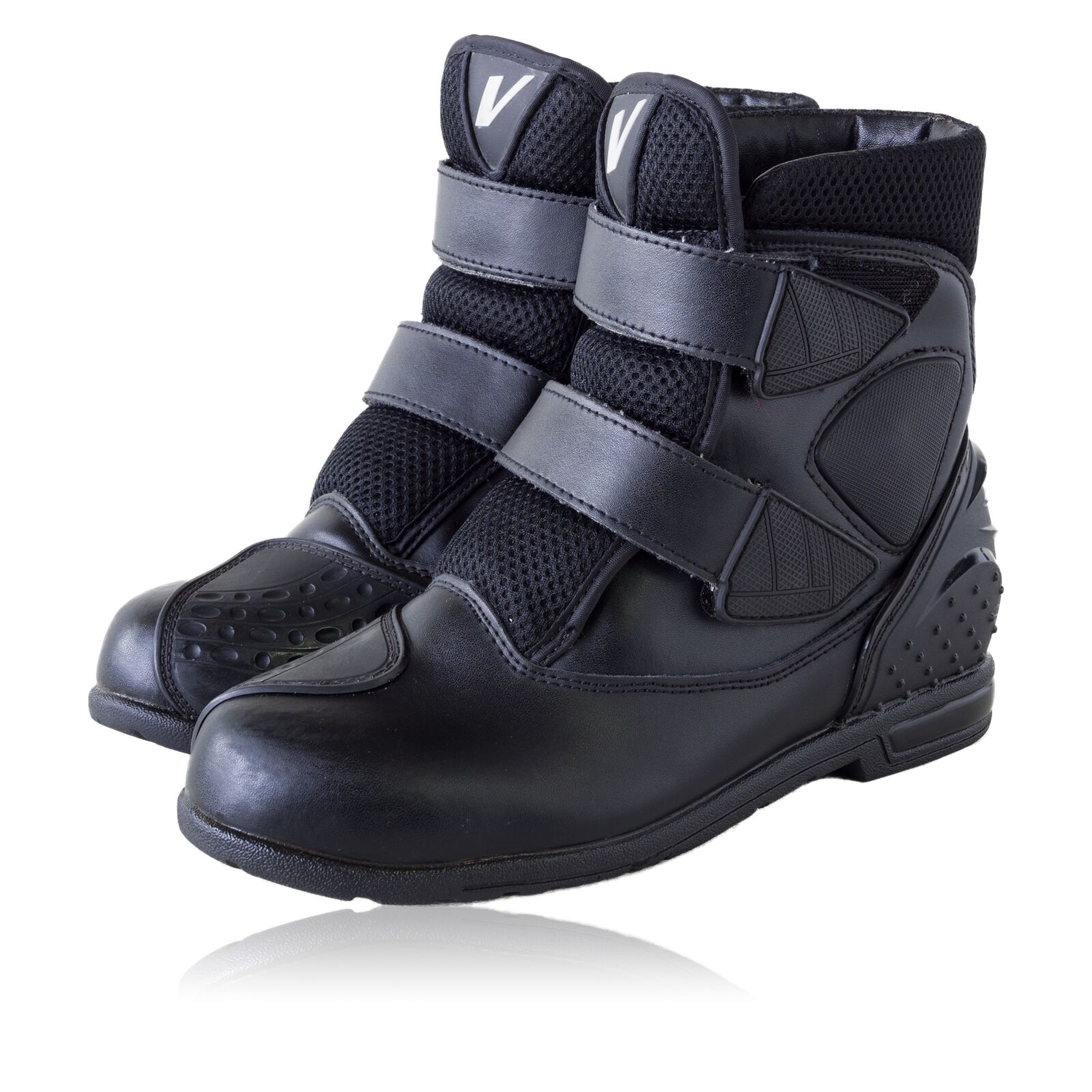 Olympus M.Zuiko Digital ED 12-100mm F4.0 IS Pro sample photo. Isolated, motorcycle boots, leather photography