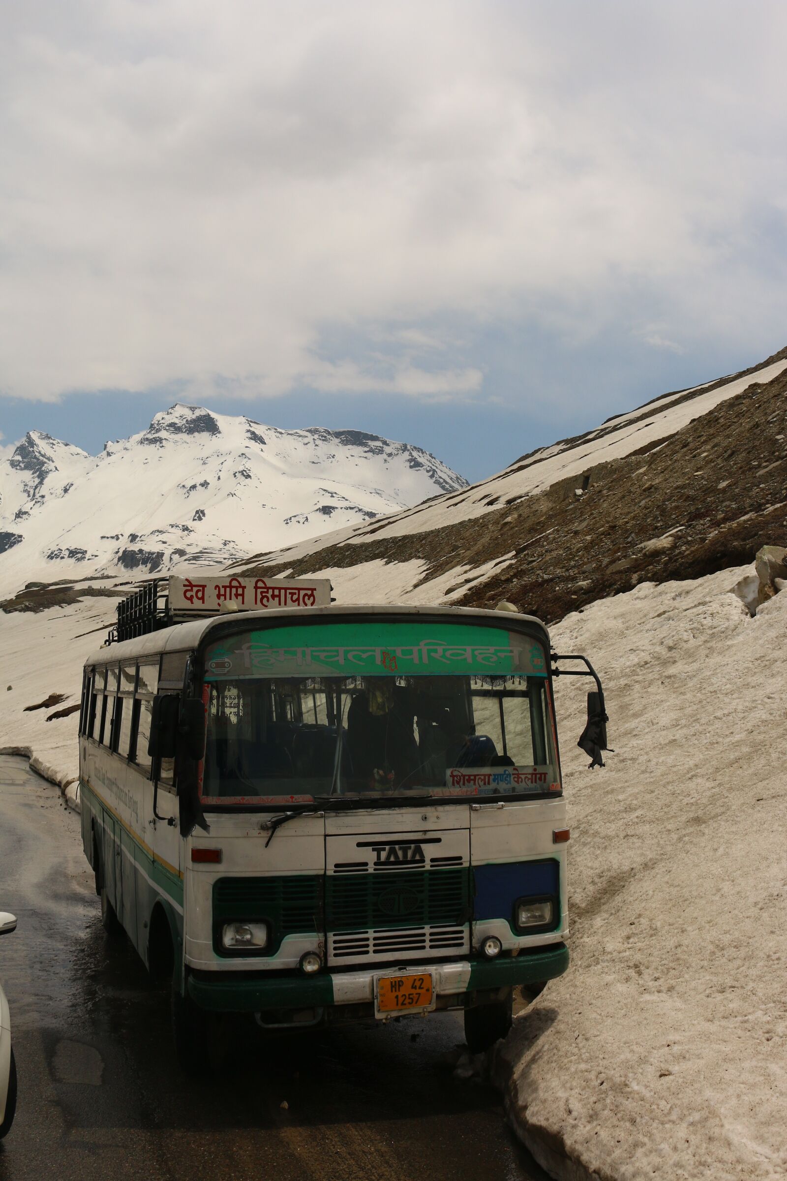 Canon EOS 70D sample photo. Drive, snow path, mountains photography