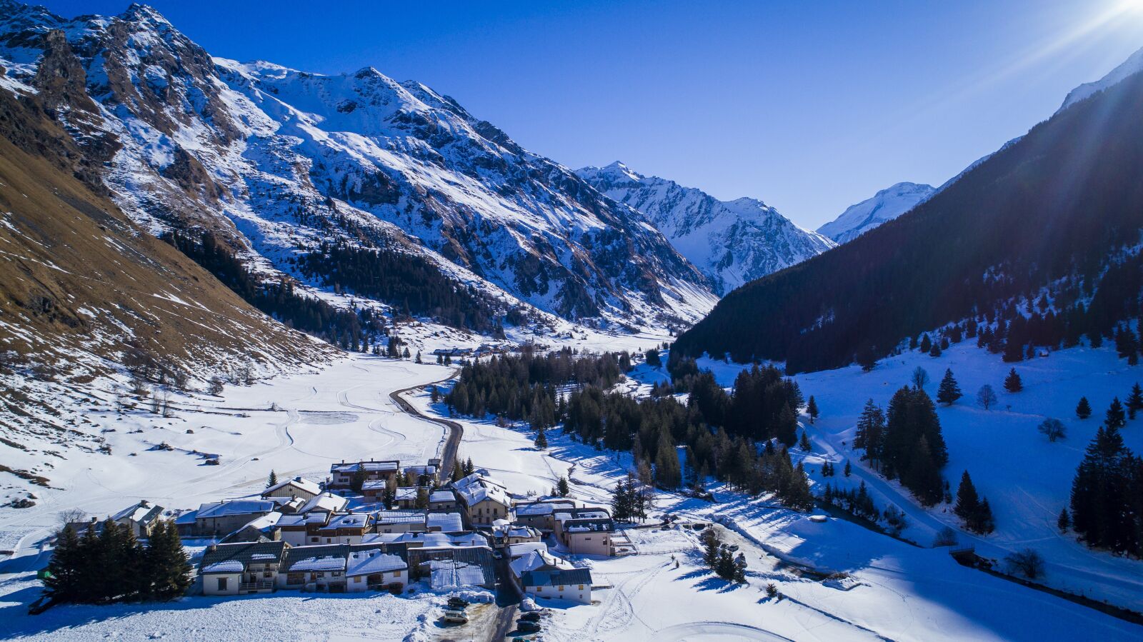 DJI FC6310 sample photo. Drone, snow, village photography