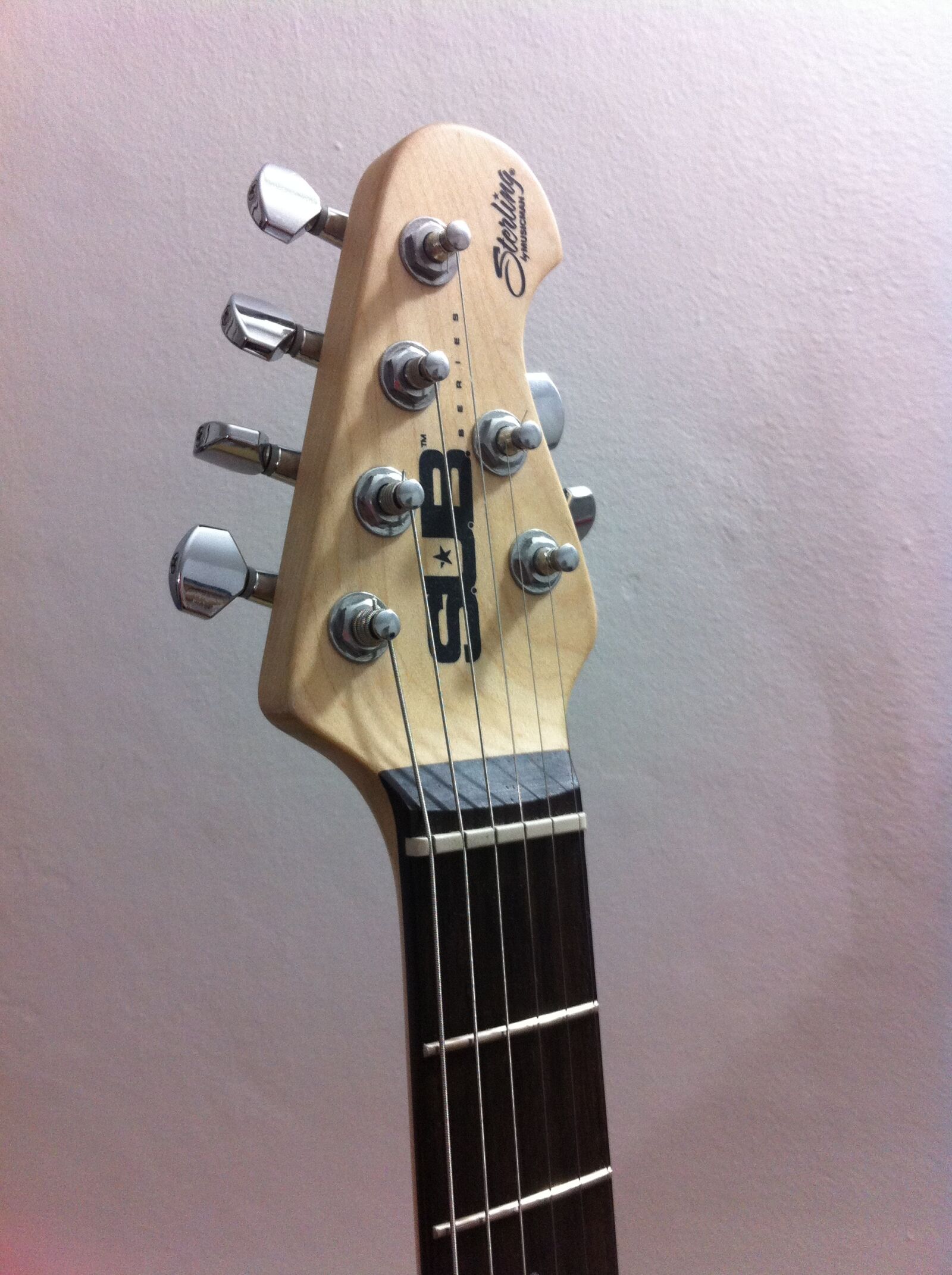 iPhone 4 back camera 3.85mm f/2.8 sample photo. Guitar, music man, instrument photography