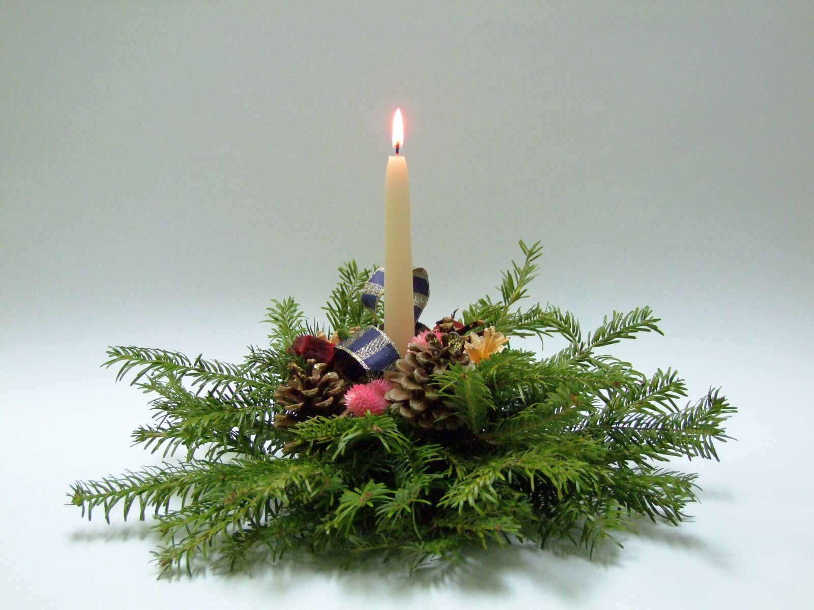 Fujifilm FinePix S100fs sample photo. Candle, flame, pine photography