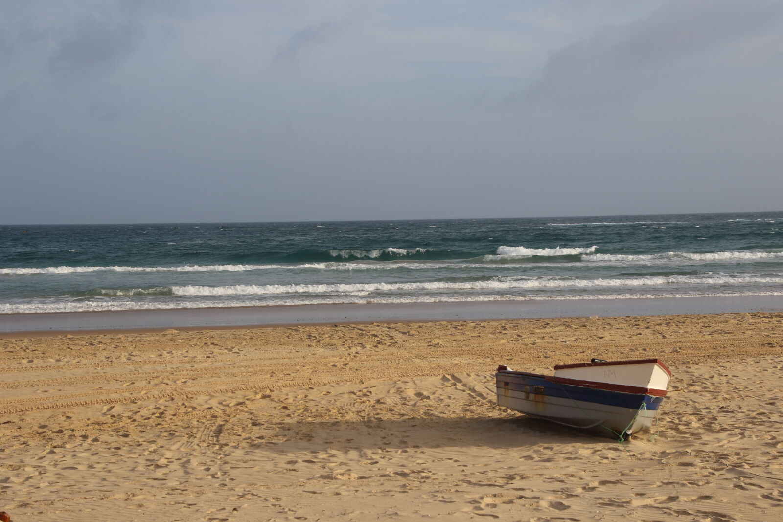 Canon EOS 7D Mark II sample photo. Beach, boat, fish, fishing photography