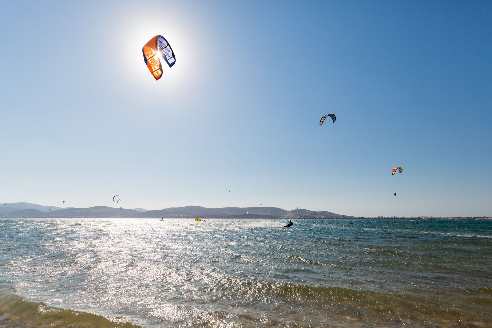Canon EF 16-35mm F4L IS USM sample photo. Kiteboarding, ocean, sky photography