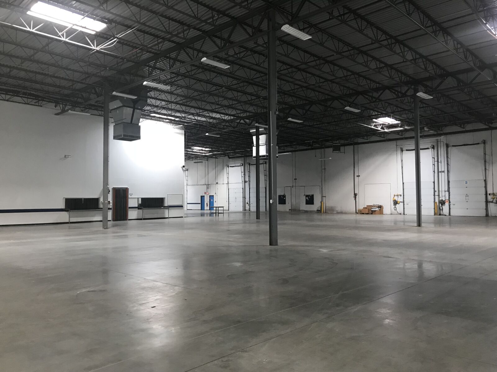 iPhone 7 back camera 3.99mm f/1.8 sample photo. Warehouse, vacant, industrial photography