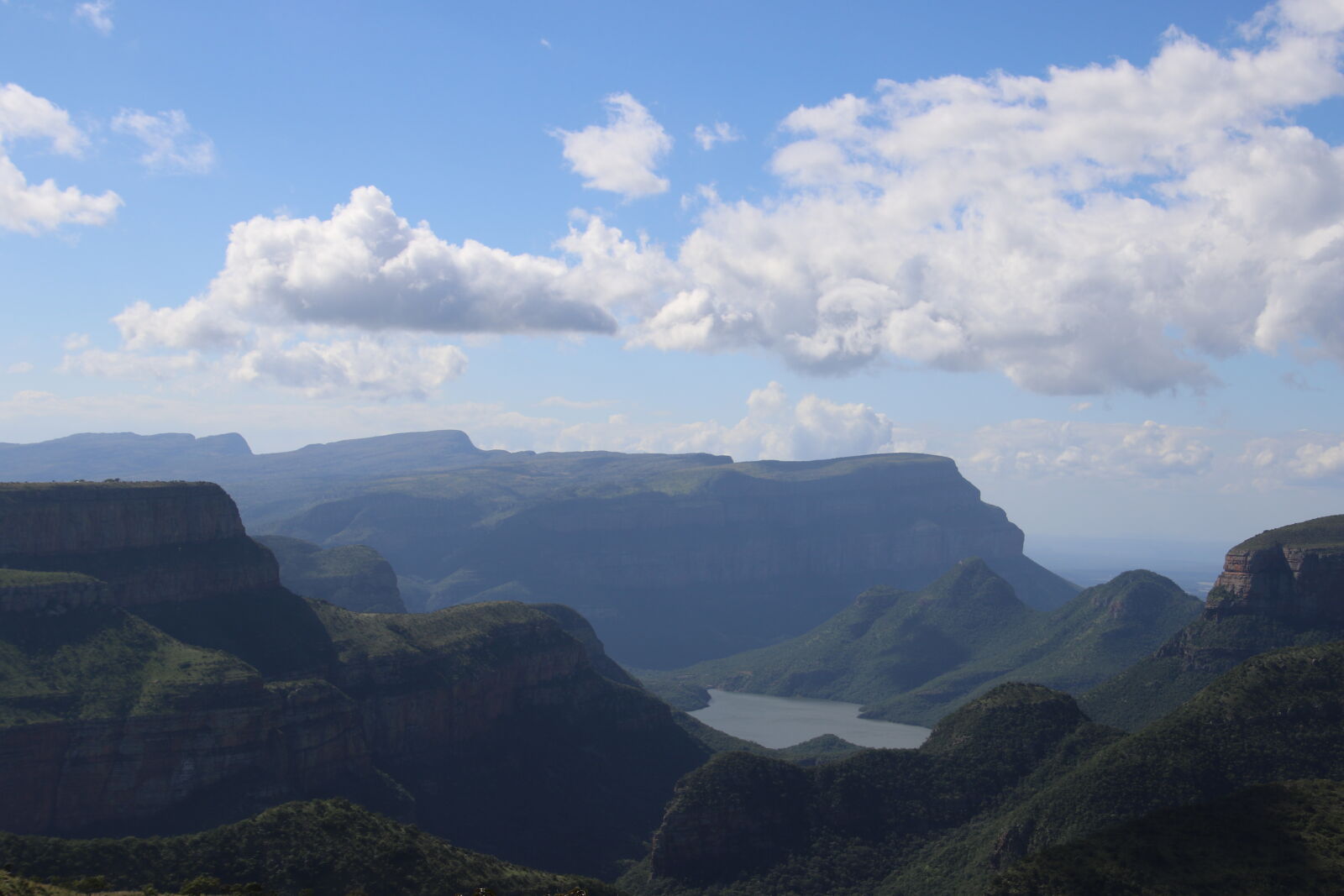 Canon EOS 7D Mark II sample photo. Clouds, dam, hills, mountains photography