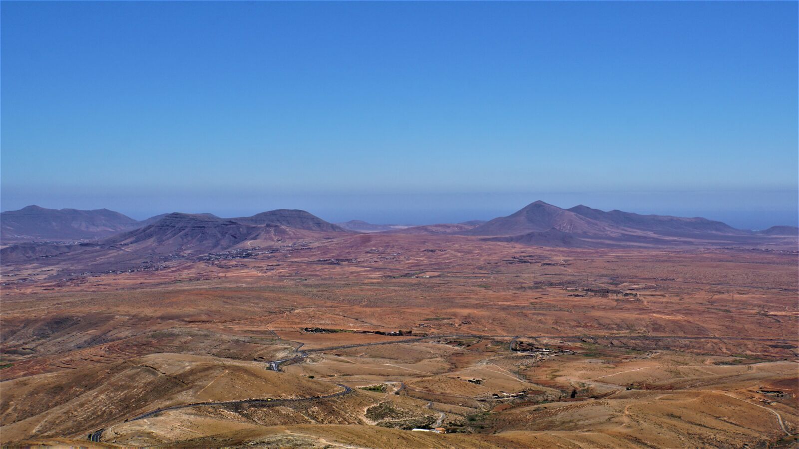 Sony E 18-200mm F3.5-6.3 OSS LE sample photo. Fuerteventura, mountains, sea photography