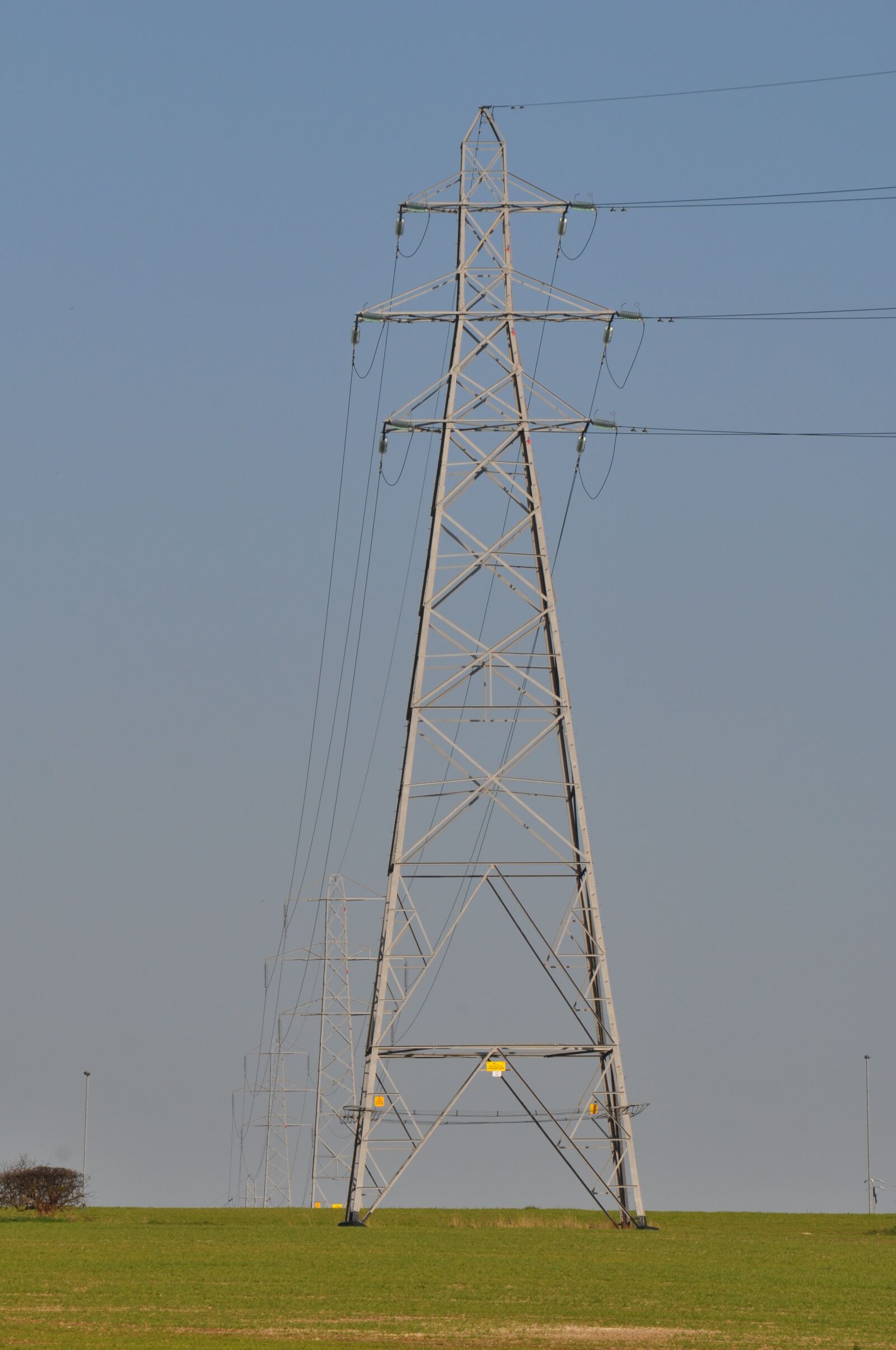 Nikon D5000 sample photo. Electricity pylon, field, electricity photography
