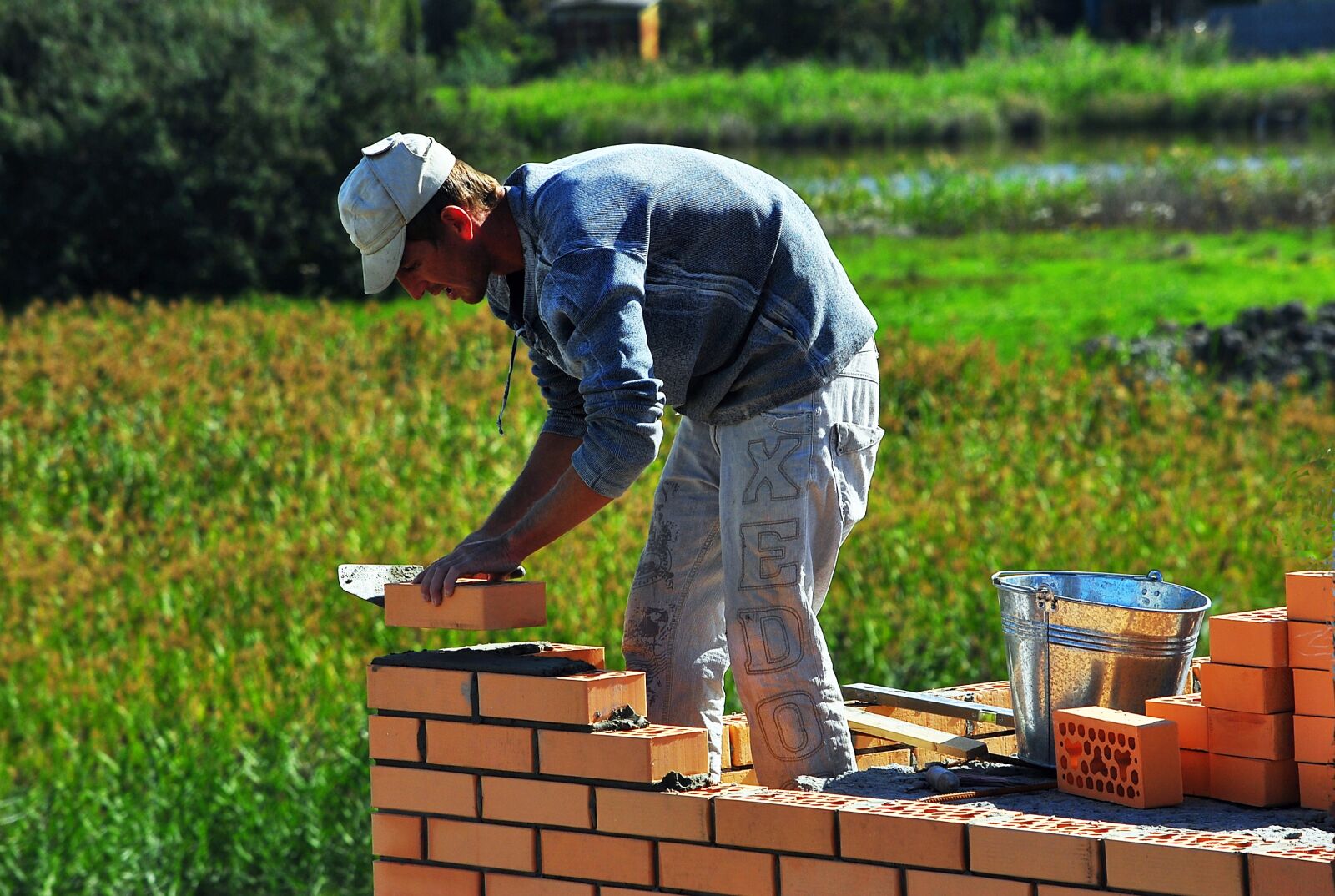 Nikon D3000 sample photo. Mason, brick, level photography