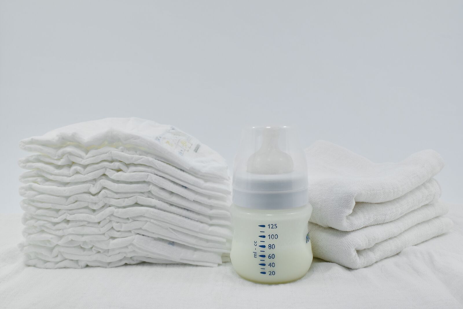 Nikon D5500 sample photo. Baby, cosmetics, cotton, diaper photography