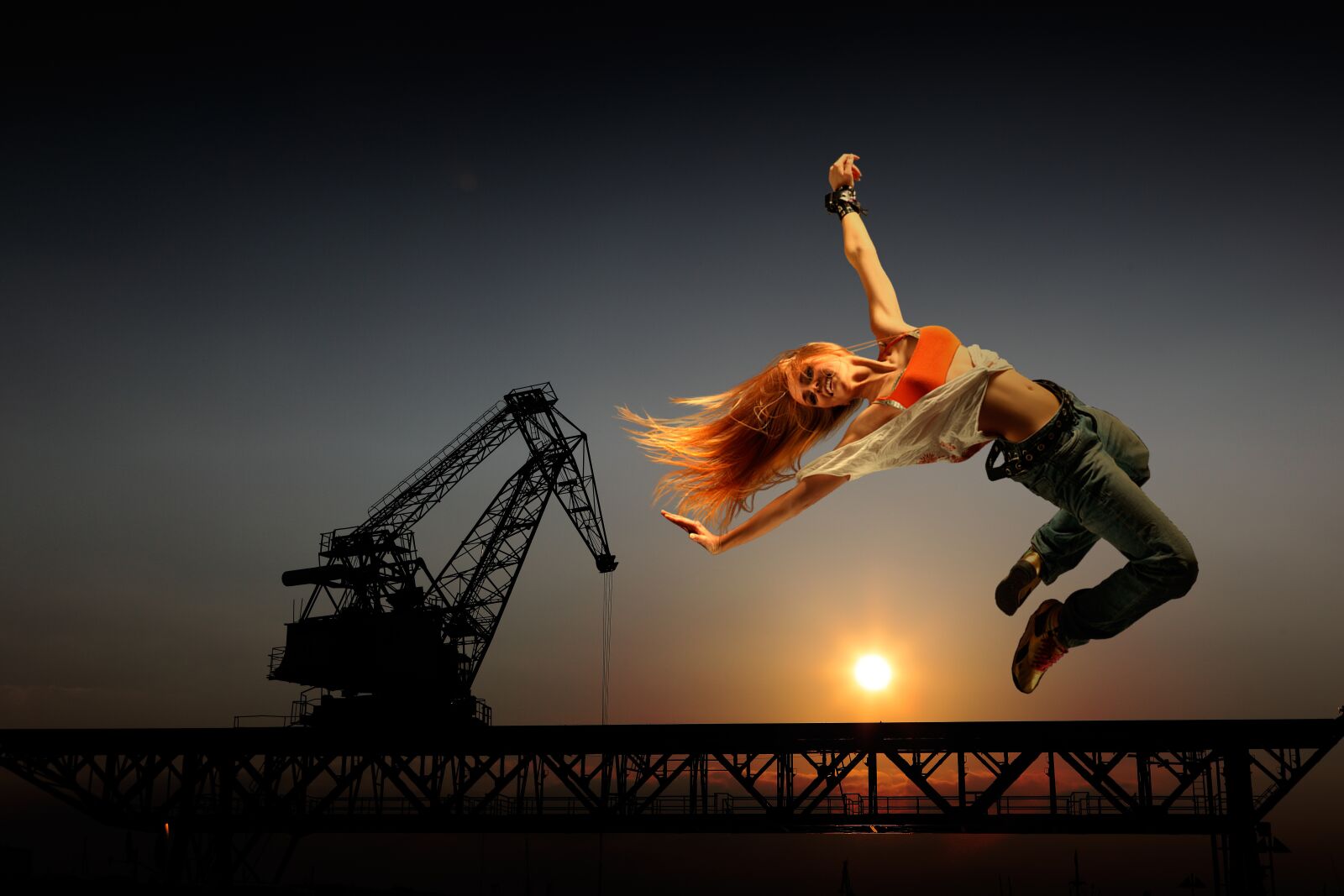 Canon EOS 5D Mark II sample photo. Joyful leap, woman, jeans photography