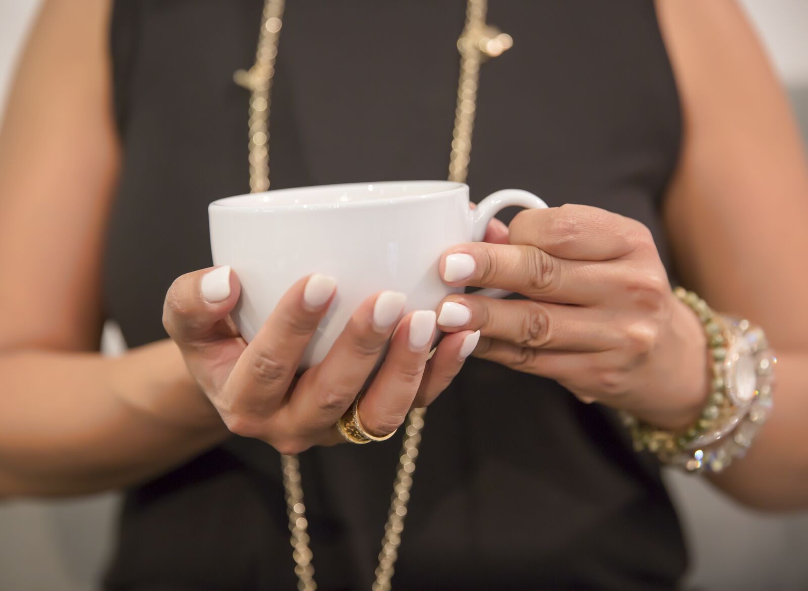 Canon EF 24-70mm F2.8L II USM sample photo. Woman, hand, coffee cup photography