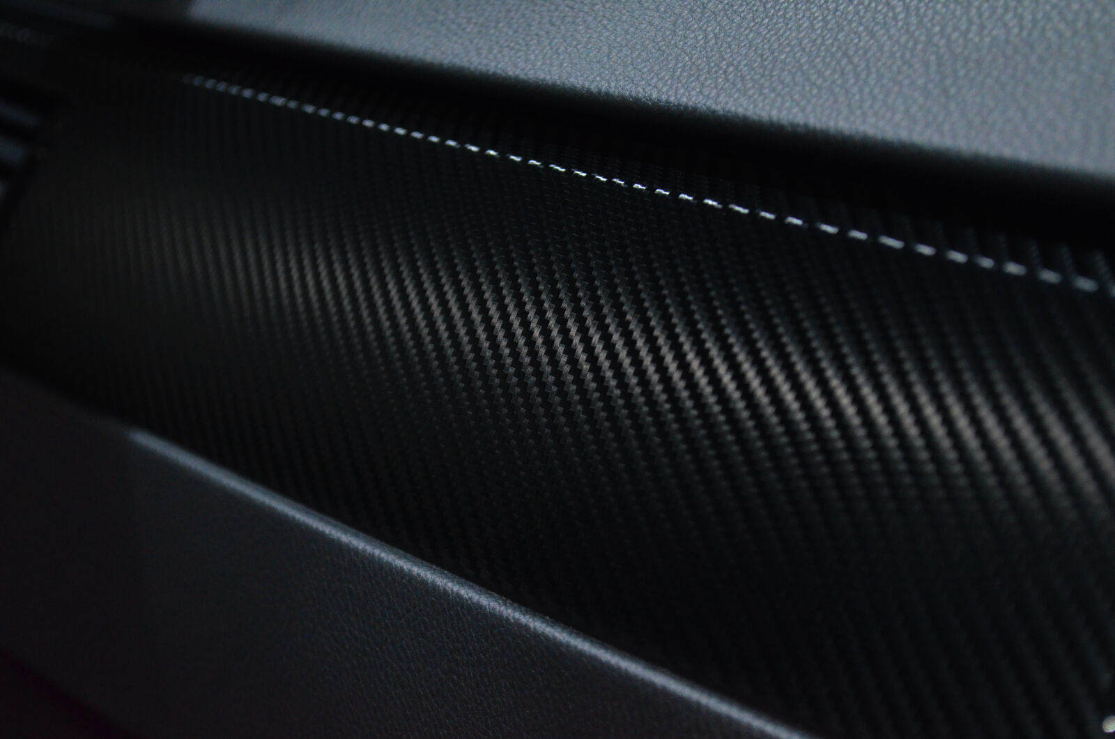 Nikon D5100 sample photo. Carbon, carbon, fiber, dark photography