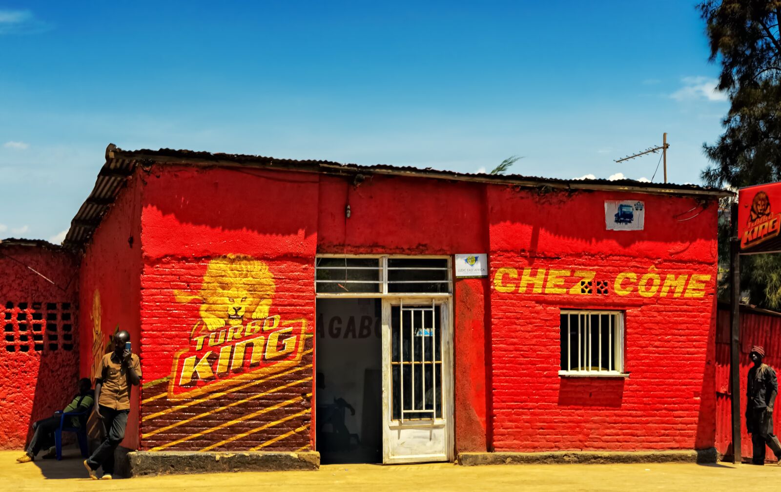 Sony a6000 sample photo. Betting office, red, building photography