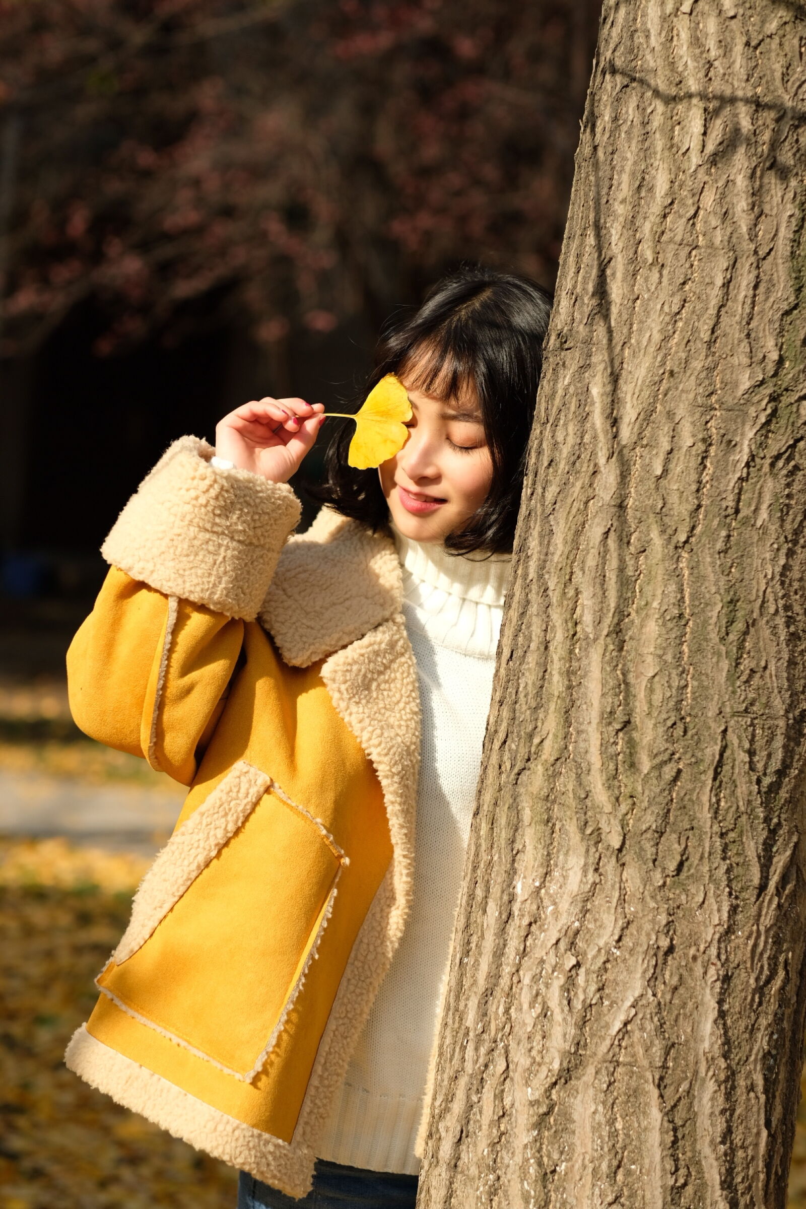 Fujifilm X-T2 sample photo. Woman, wearing, yellow, jacket photography