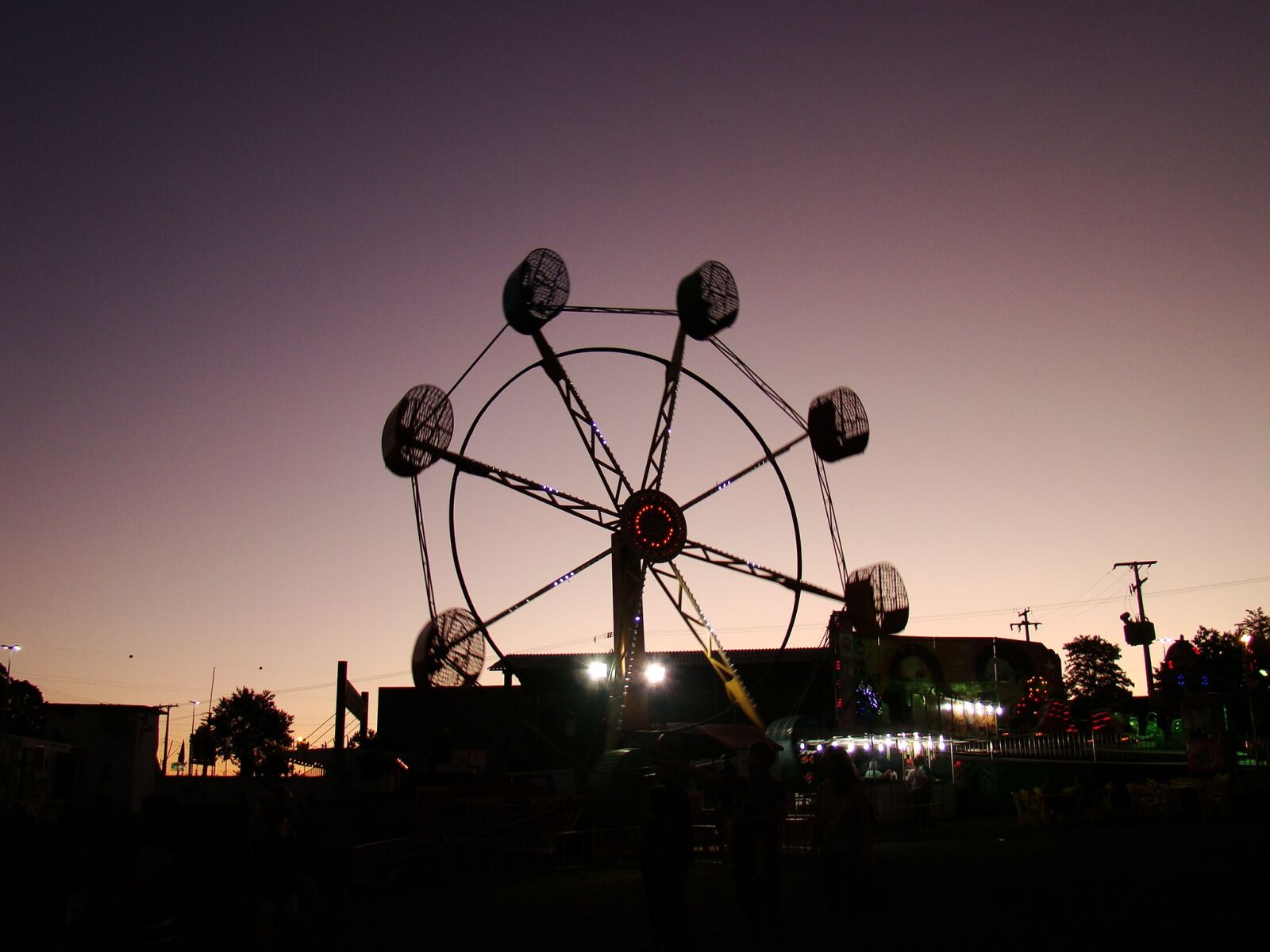 Sony Cyber-shot DSC-H50 sample photo. Ferris wheel, park, sunset photography
