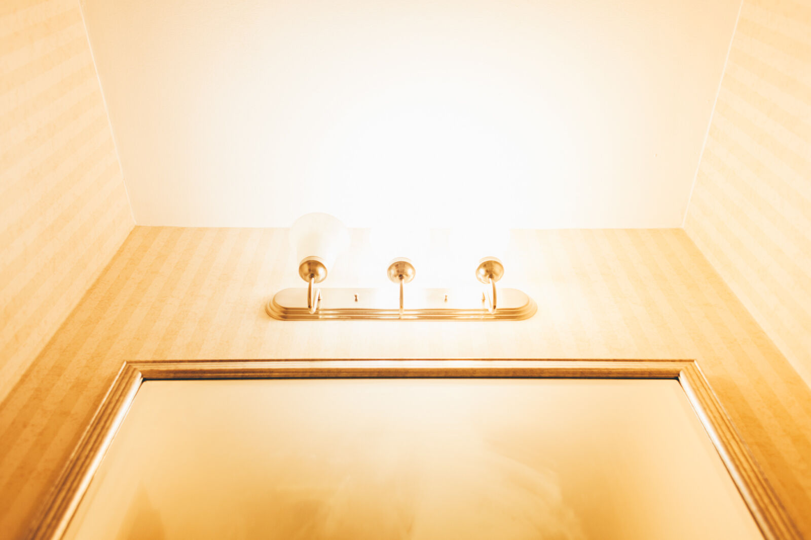 Canon EF 28mm F1.8 USM sample photo. Bathroom, ceiling, gold, golden photography