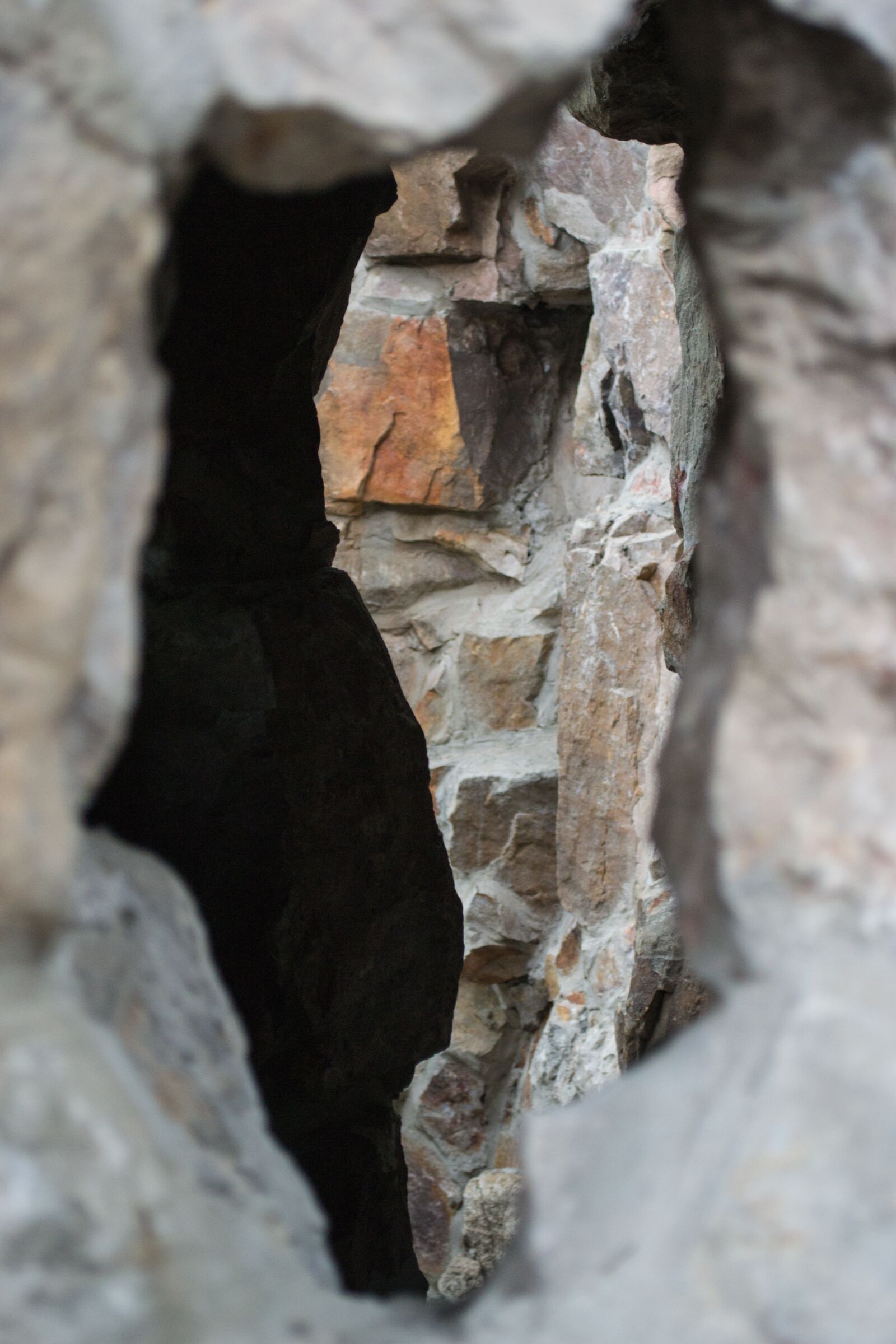 Nikon D3100 sample photo. Stone, hiding place, wall photography