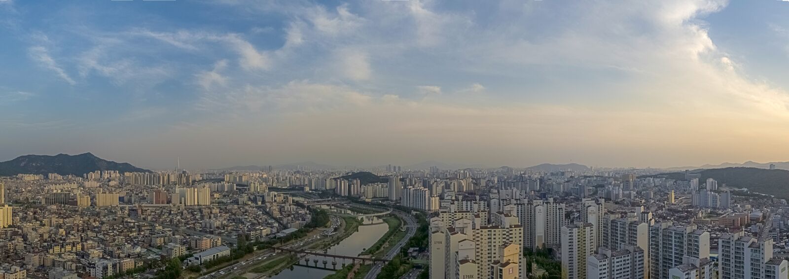 DJI MFT 15mm F1.7 ASPH sample photo. Overlooking a bridge in photography