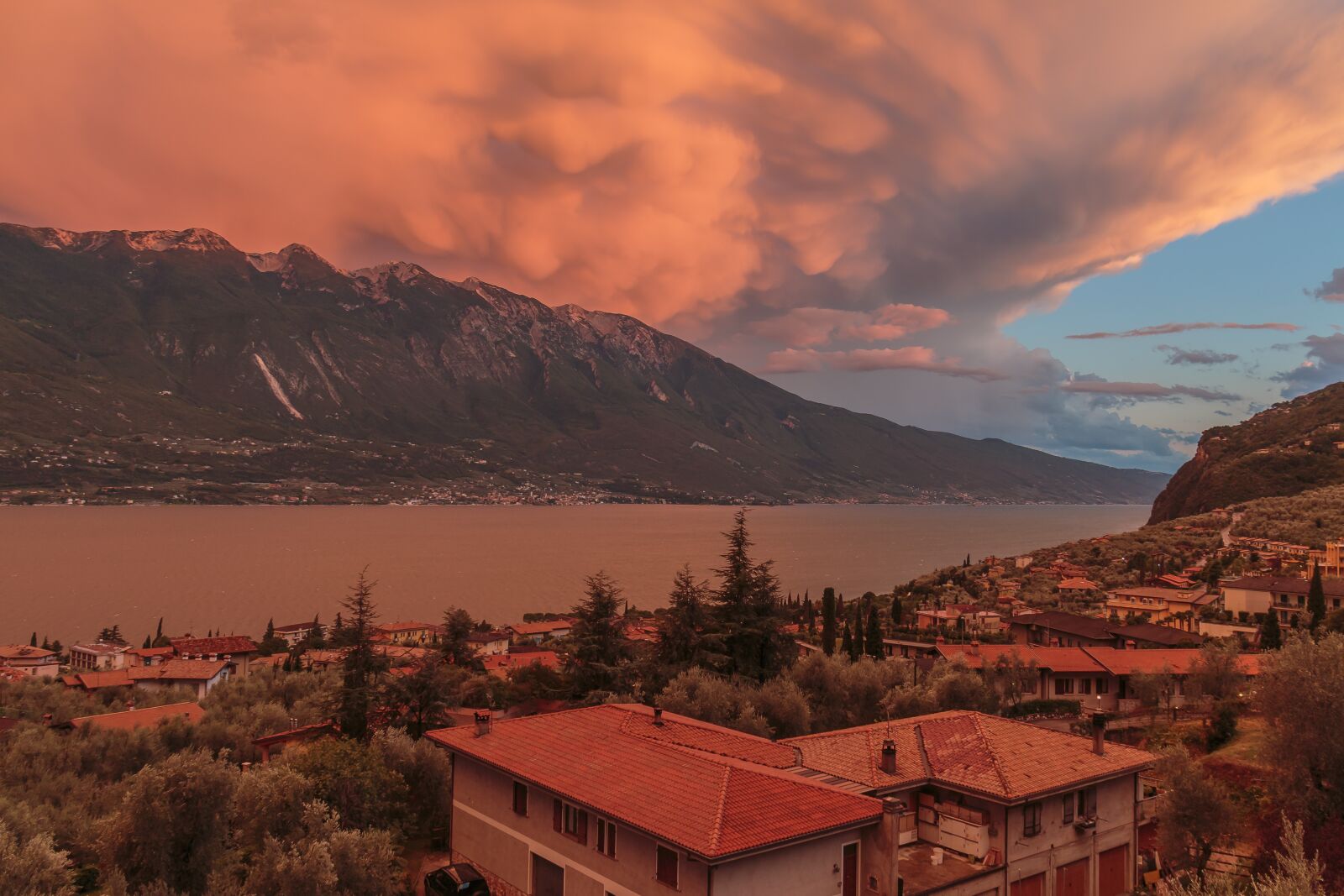 Canon EF-S 18-200mm F3.5-5.6 IS sample photo. Clouds, sunset, italy photography