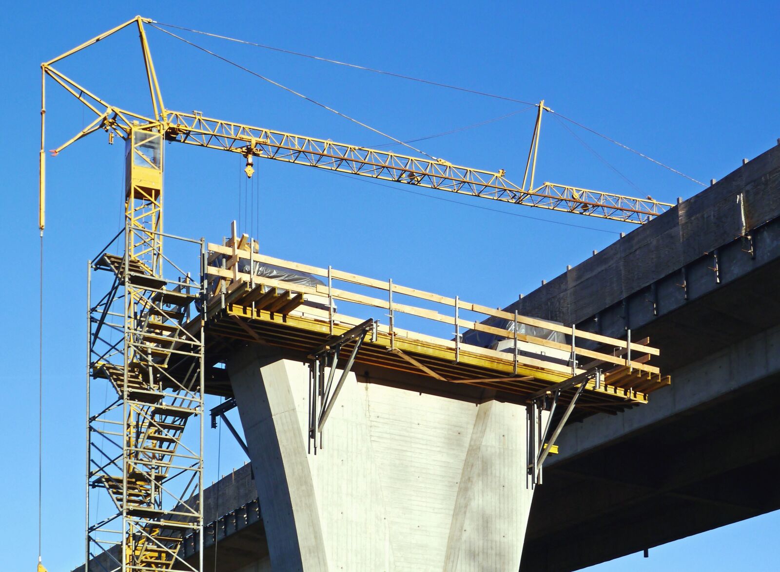 Panasonic Lumix DMC-GX1 sample photo. Bridge, architecture, crane, concrete photography