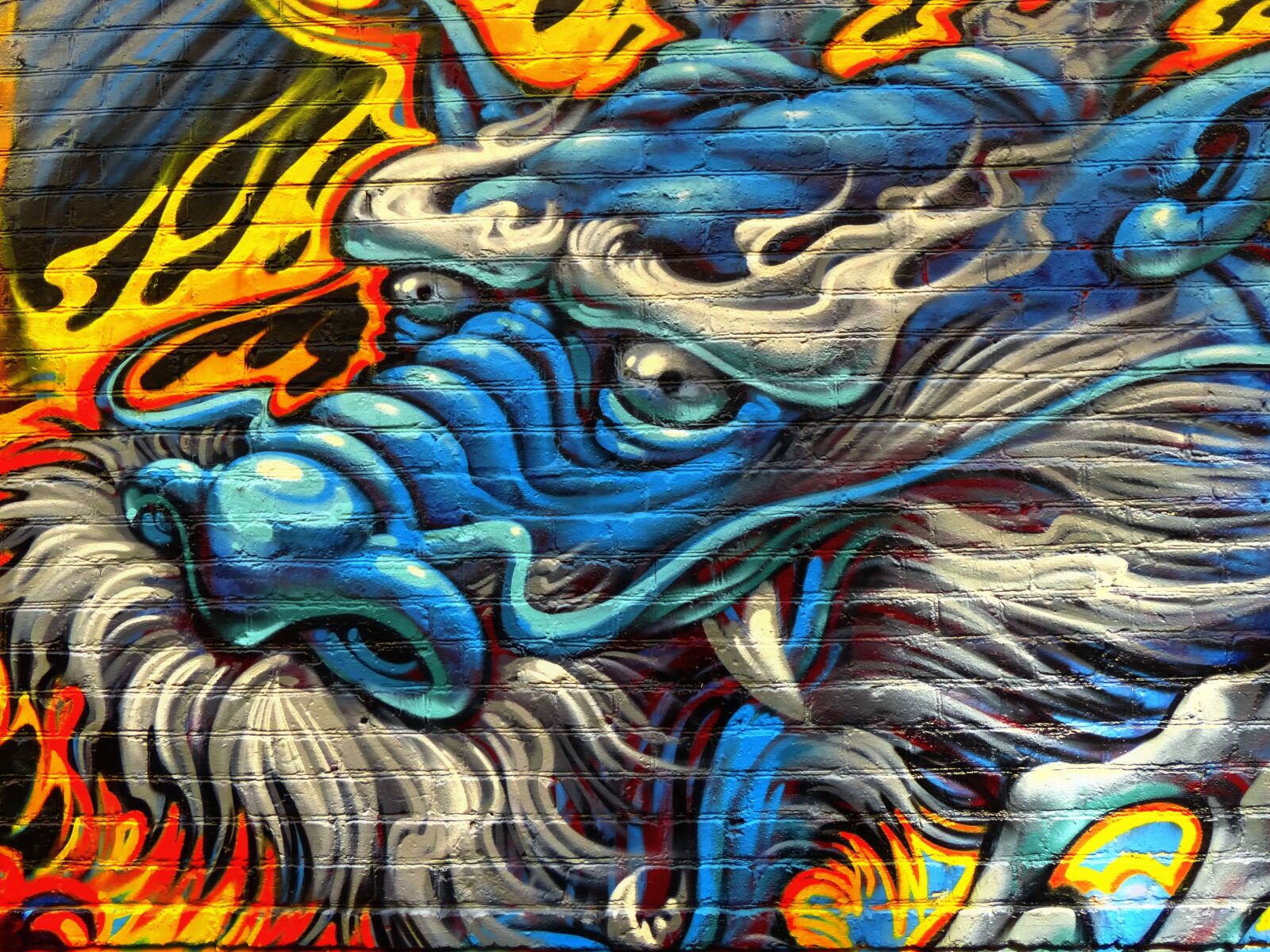 Panasonic Lumix DMC-FZ200 sample photo. Dragon, editorial, graffiti photography