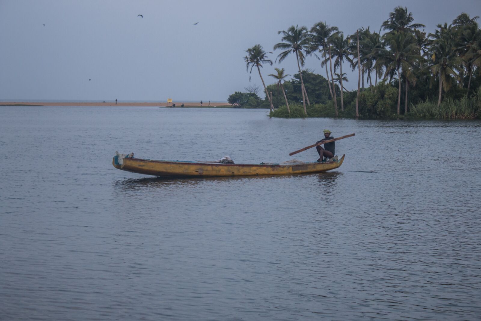 Canon EF-S 18-55mm F3.5-5.6 IS sample photo. Fisherman, boat, fishing photography
