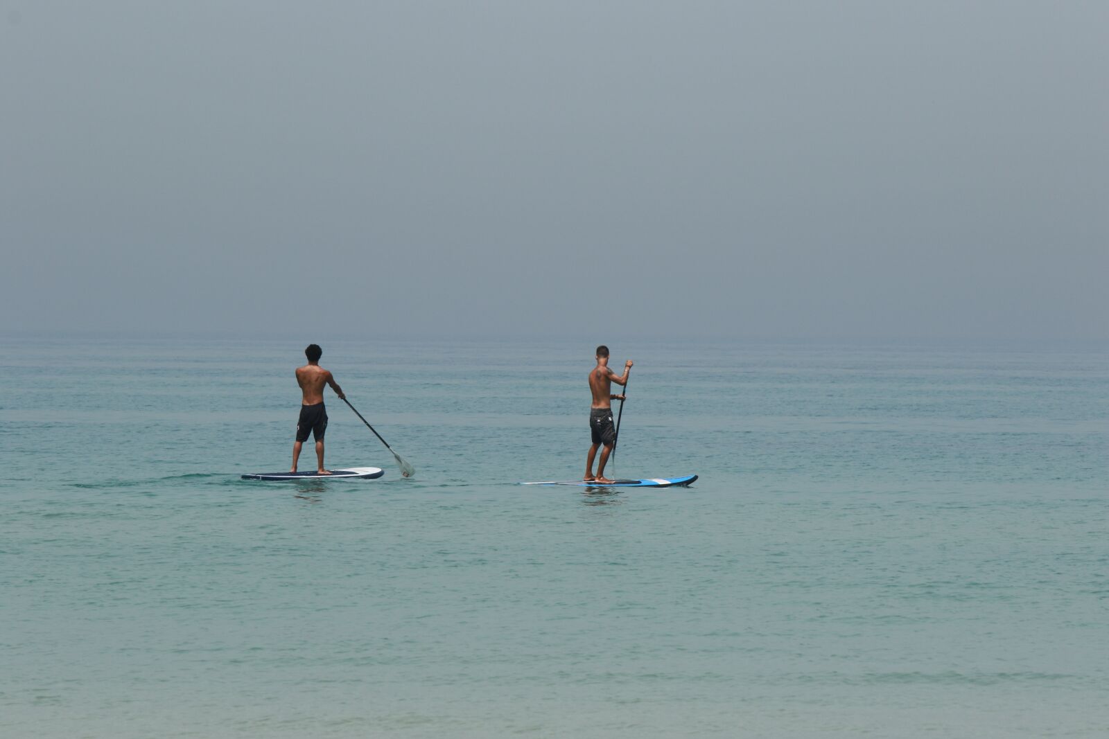 Canon EOS 7D Mark II sample photo. Men, sea, sup photography