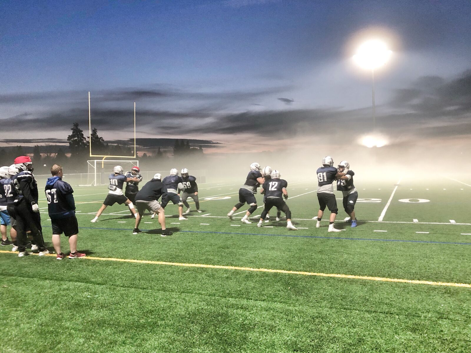 iPhone 8 Plus back dual camera 3.99mm f/1.8 sample photo. High school, football, sport photography