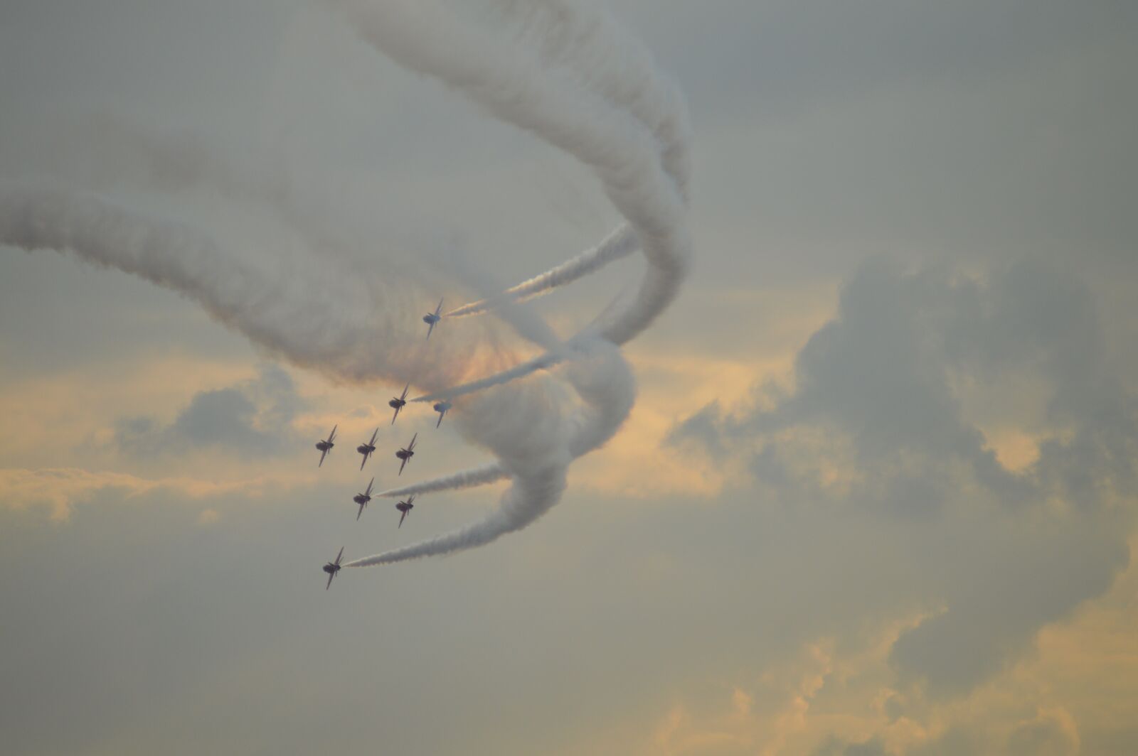 Nikon D3200 sample photo. Smoke trails, red arrows photography