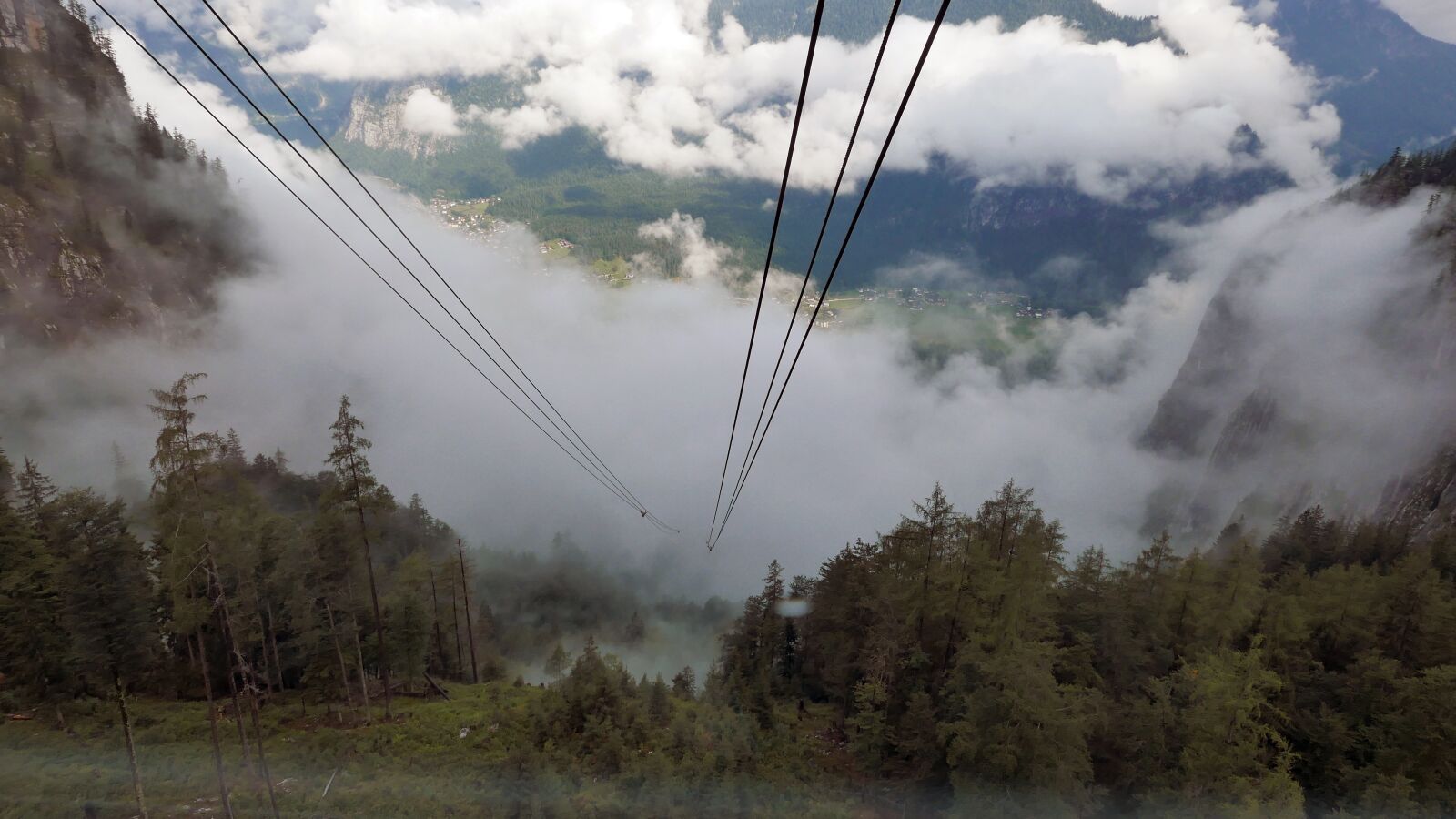 Panasonic Lumix DMC-LX100 sample photo. Clouds, lift, alpine photography
