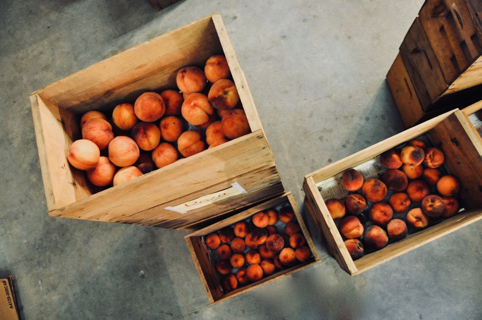 Nikon D5000 sample photo. Peach, wooden boxes, storage photography