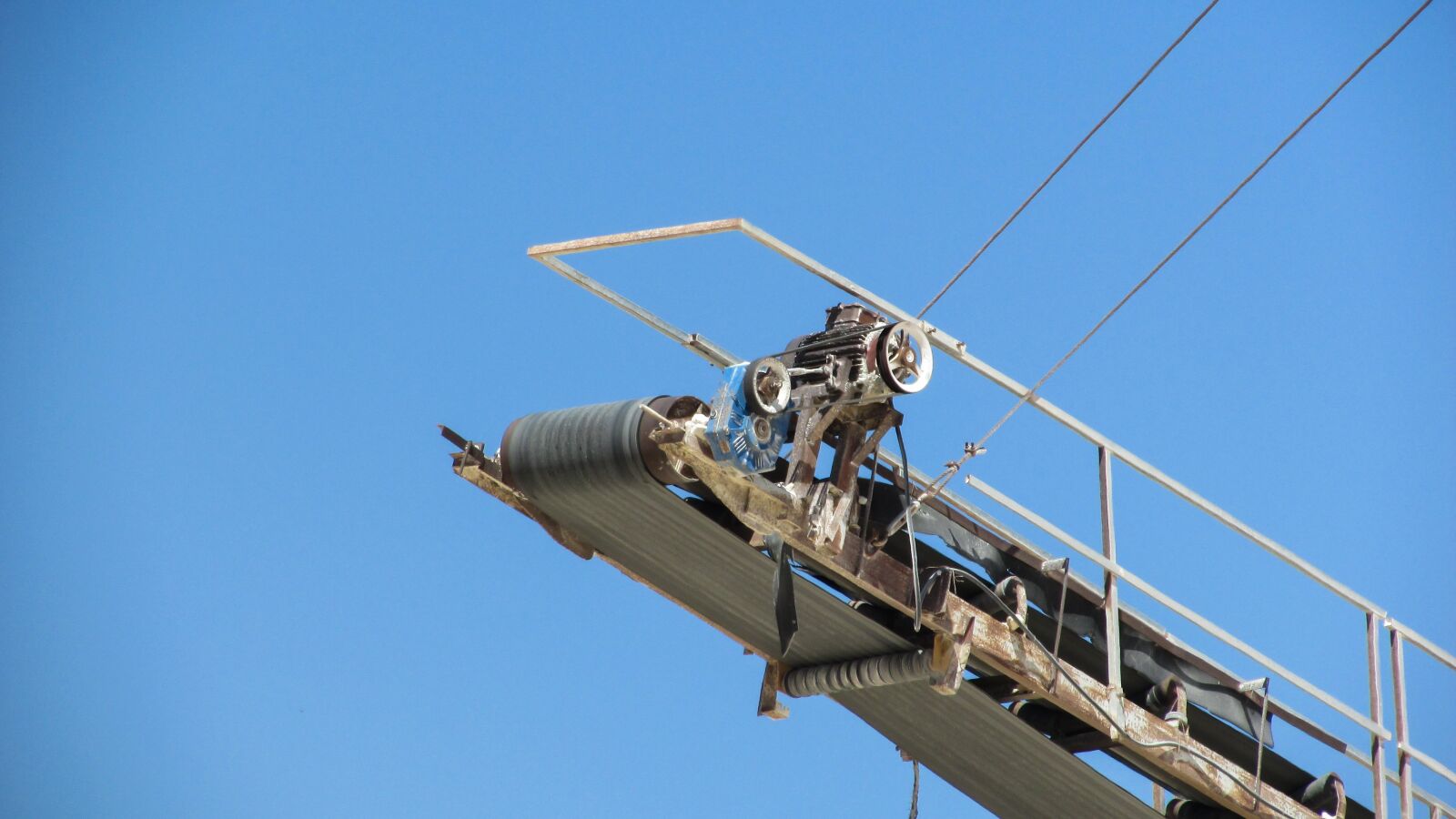 Canon PowerShot SX400 IS sample photo. Quarry belt, quarry, equipment photography
