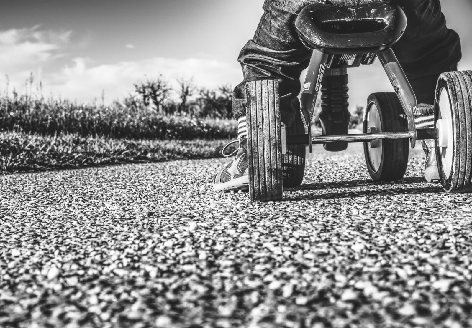 Sony E 16-50mm F3.5-5.6 PZ OSS sample photo. Small child, bike, impeller photography