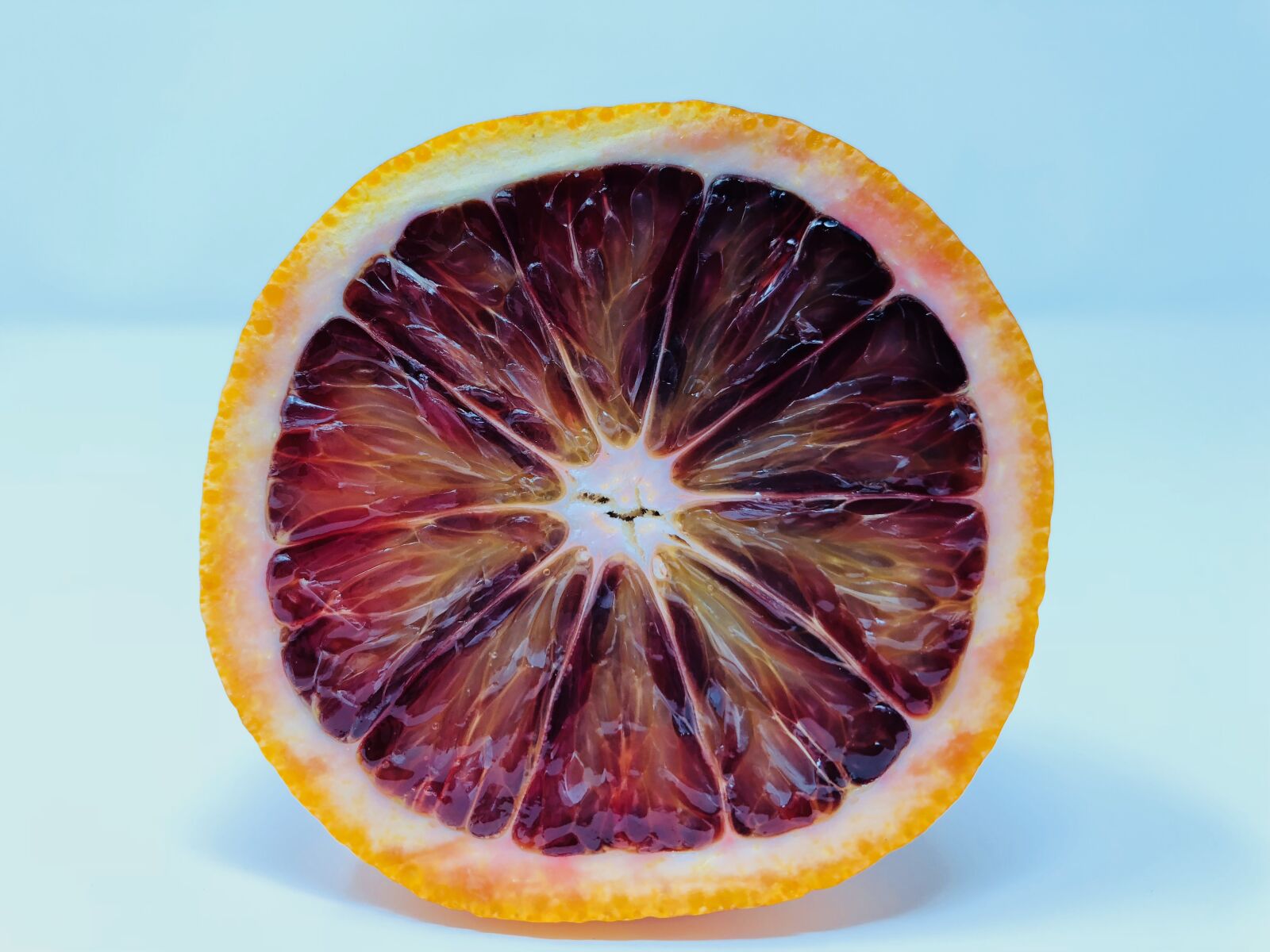 iPhone 8 back camera 3.99mm f/1.8 sample photo. Blood orange, half orange photography