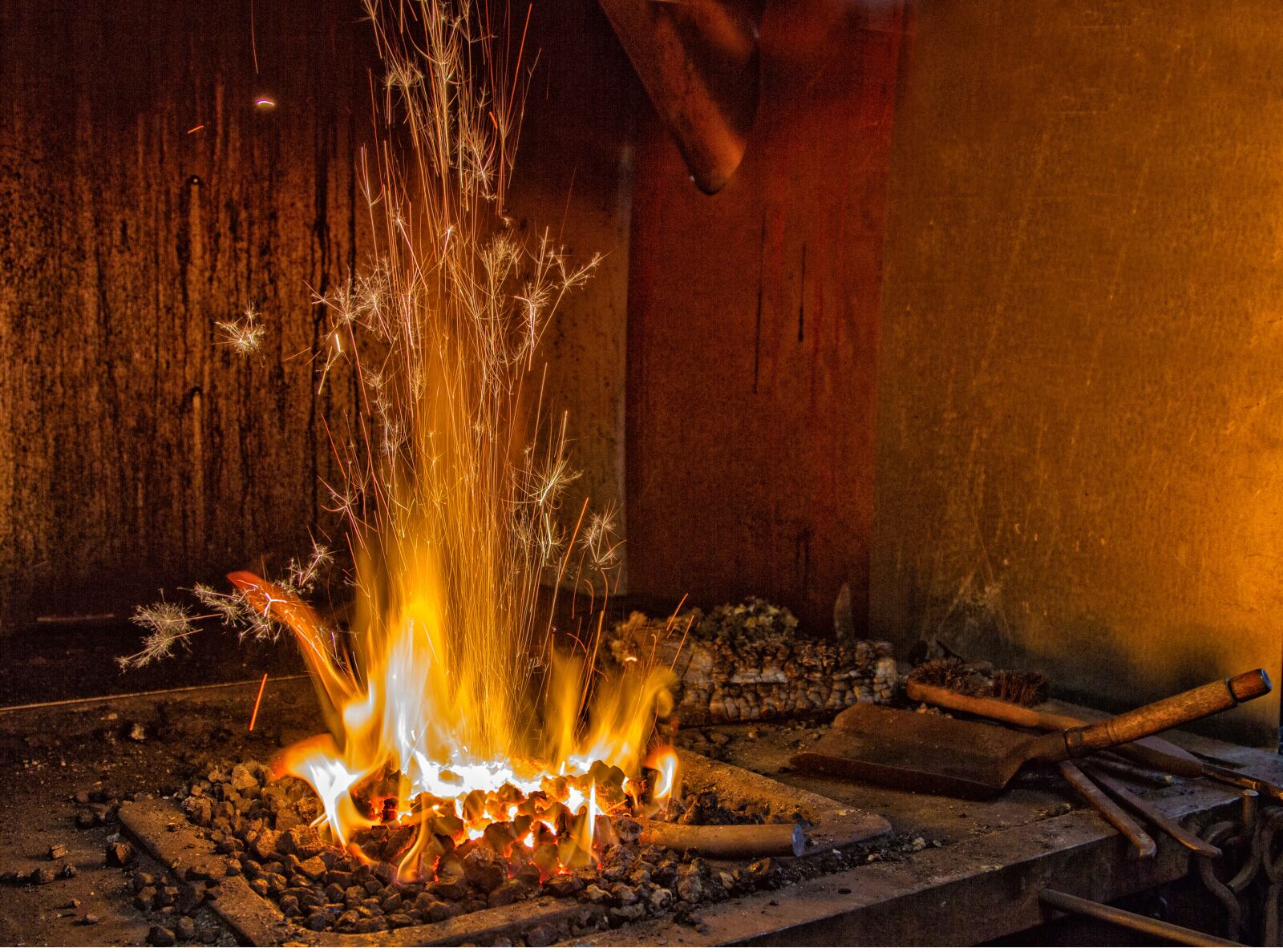 Canon EOS 7D + Canon EF 24-105mm F4L IS USM sample photo. Fire, forge, village smithy photography