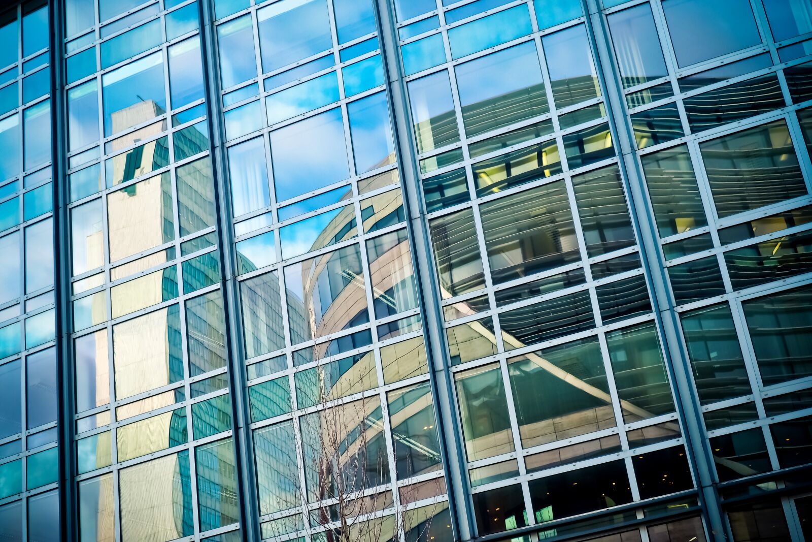 Olympus OM-D E-M10 sample photo. Architecture, glass, modern photography