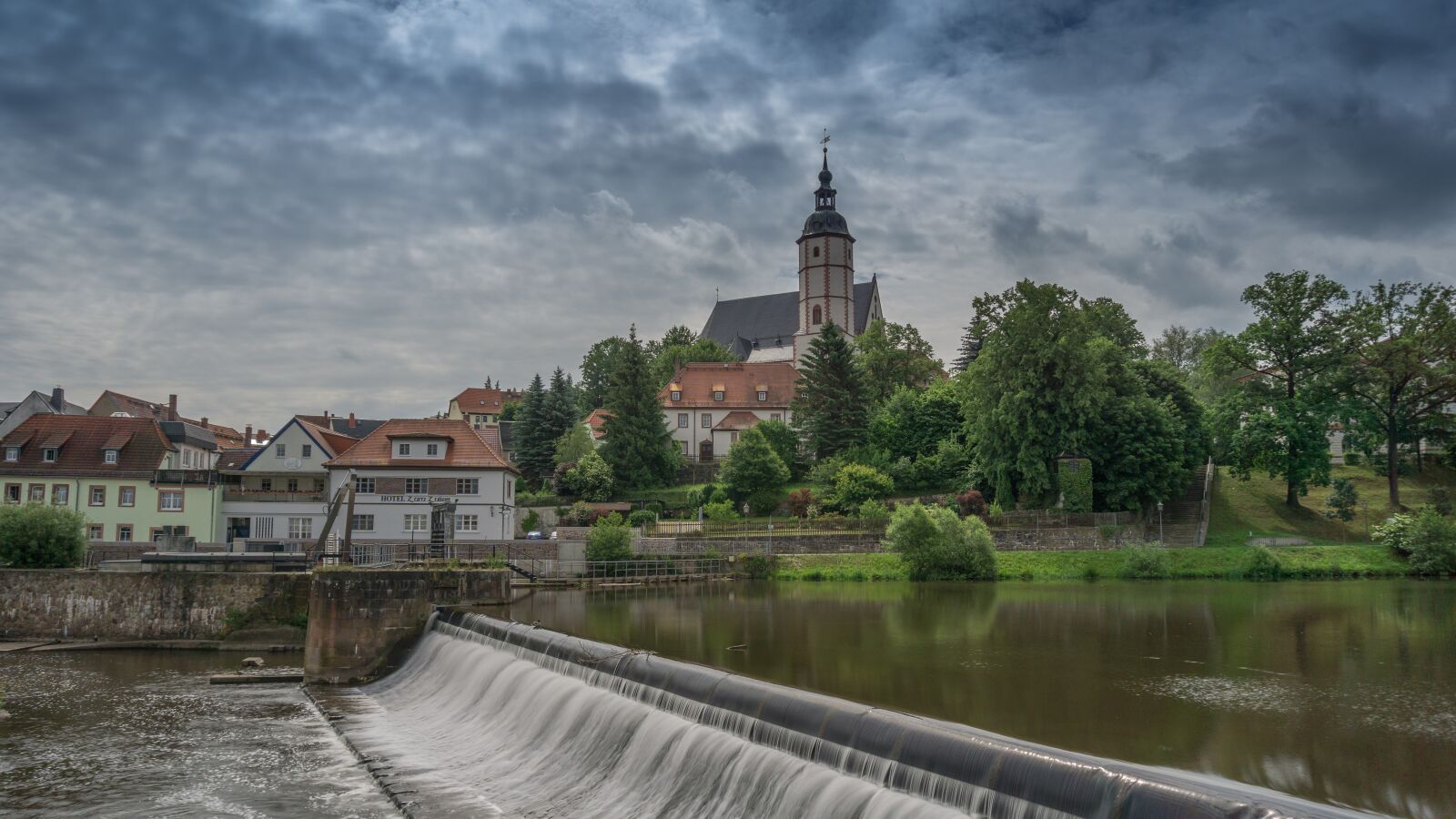 Sony a6000 sample photo. Weir, city view, water photography