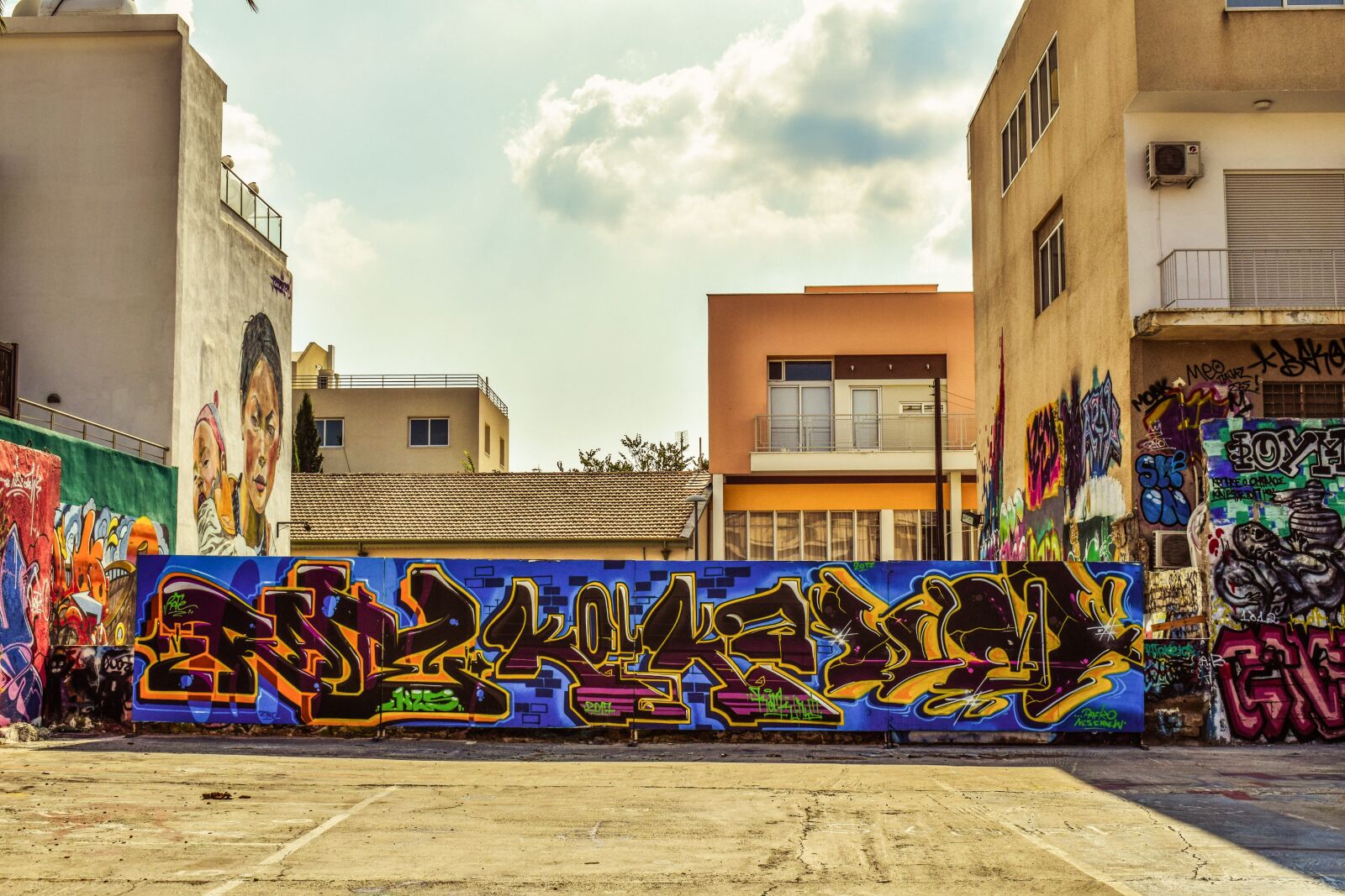 Nikon D3300 sample photo. Parking lot, graffiti, building photography