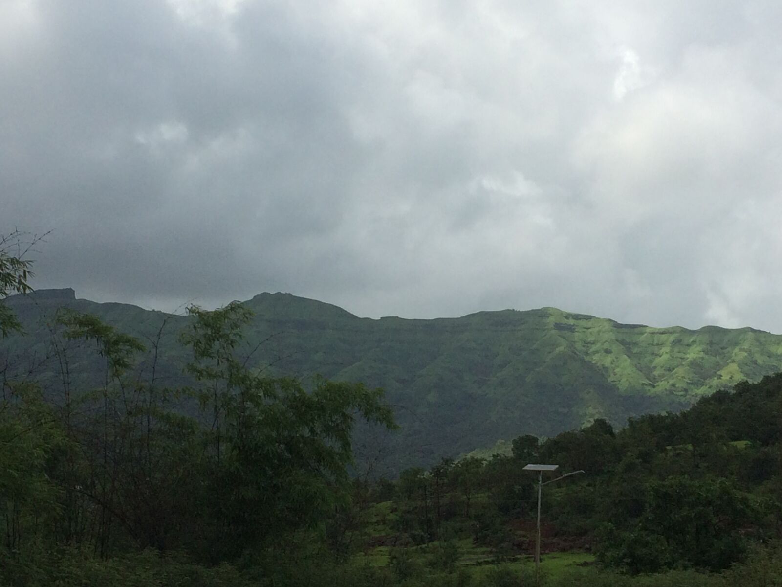 iPhone 5s back camera 4.15mm f/2.2 sample photo. Valley, hilly area, clouds photography