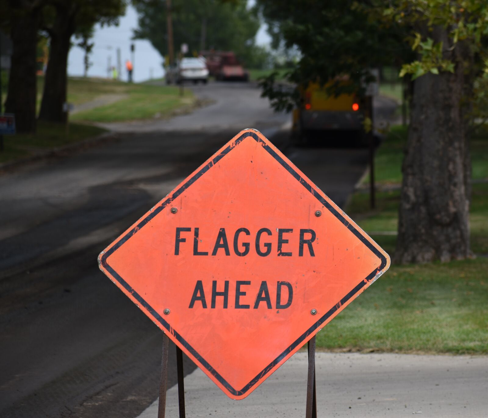 Nikon D5500 sample photo. Flagger, construction, road photography