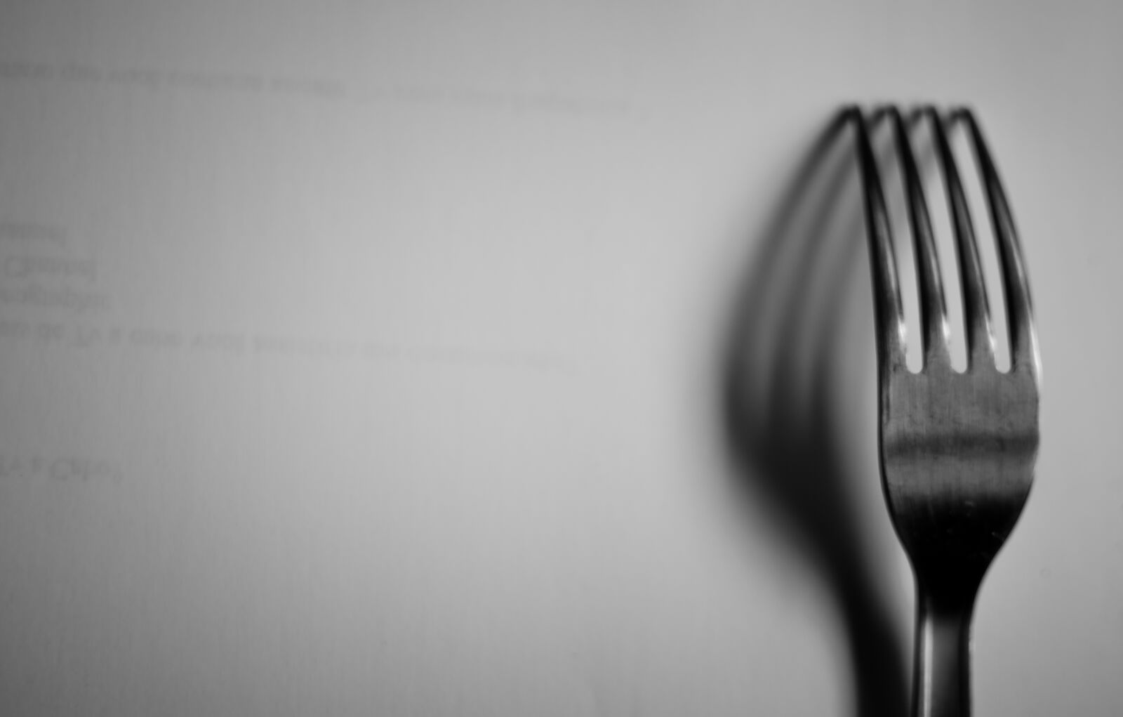 Nikon D5100 + Nikon AF-S DX Nikkor 35mm F1.8G sample photo. Fork, light, shadow, still photography