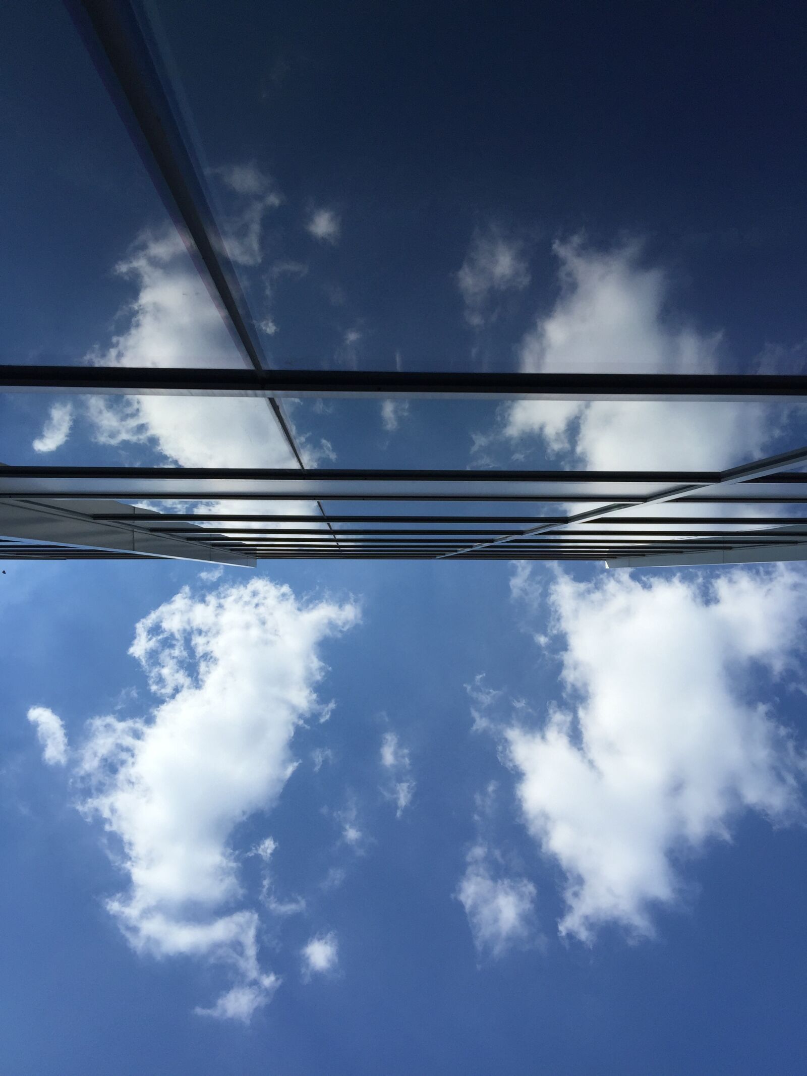 iPhone 6 Plus back camera 4.15mm f/2.2 sample photo. Reflection, building, clouds photography